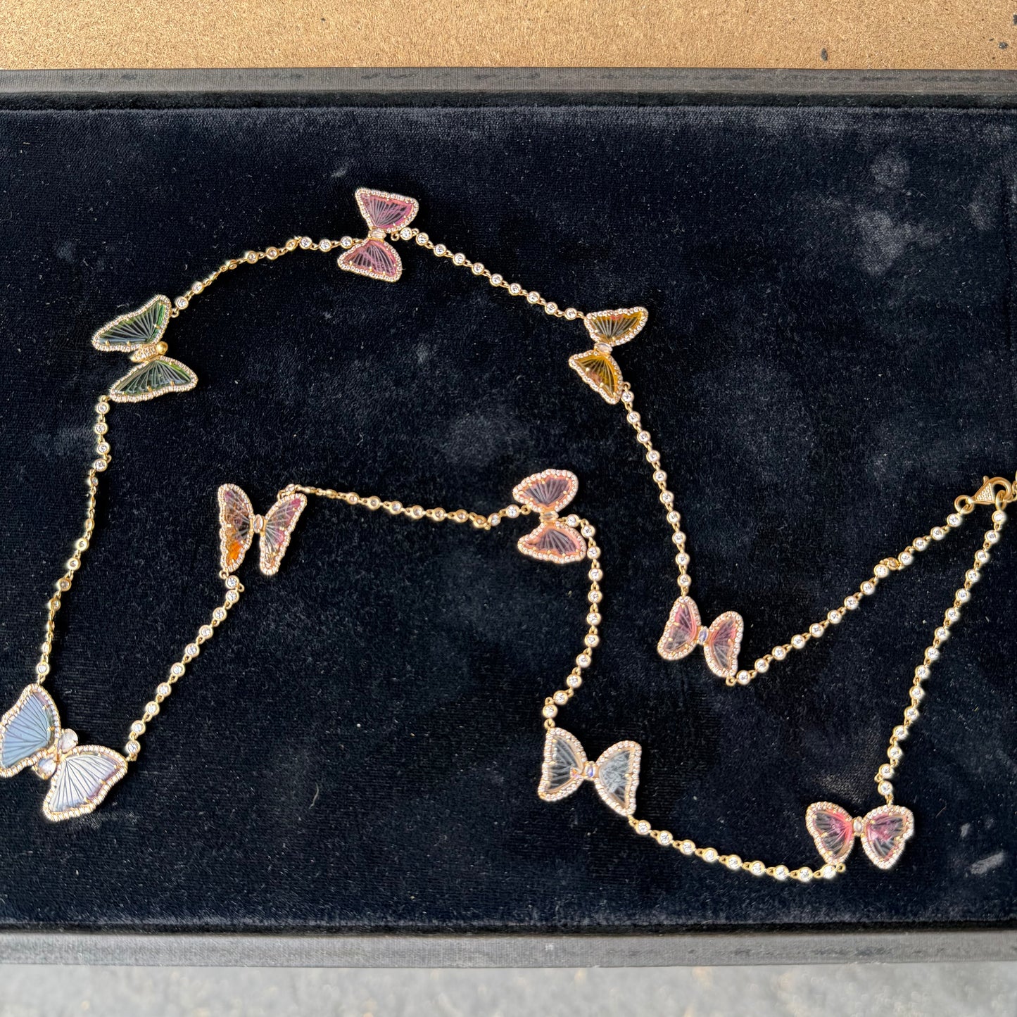 A Yellow Gold Diamond by The Yard Necklace with a 9 tourmaline & diamond butterflies at Forever Rox Fine Jewelry, Lake Tahoes Best Jewelry Store