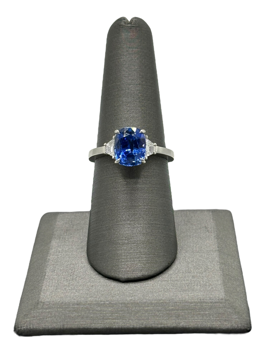 Cushion Cut Sapphire Ring With Two Trapezoid Cut Diamonds