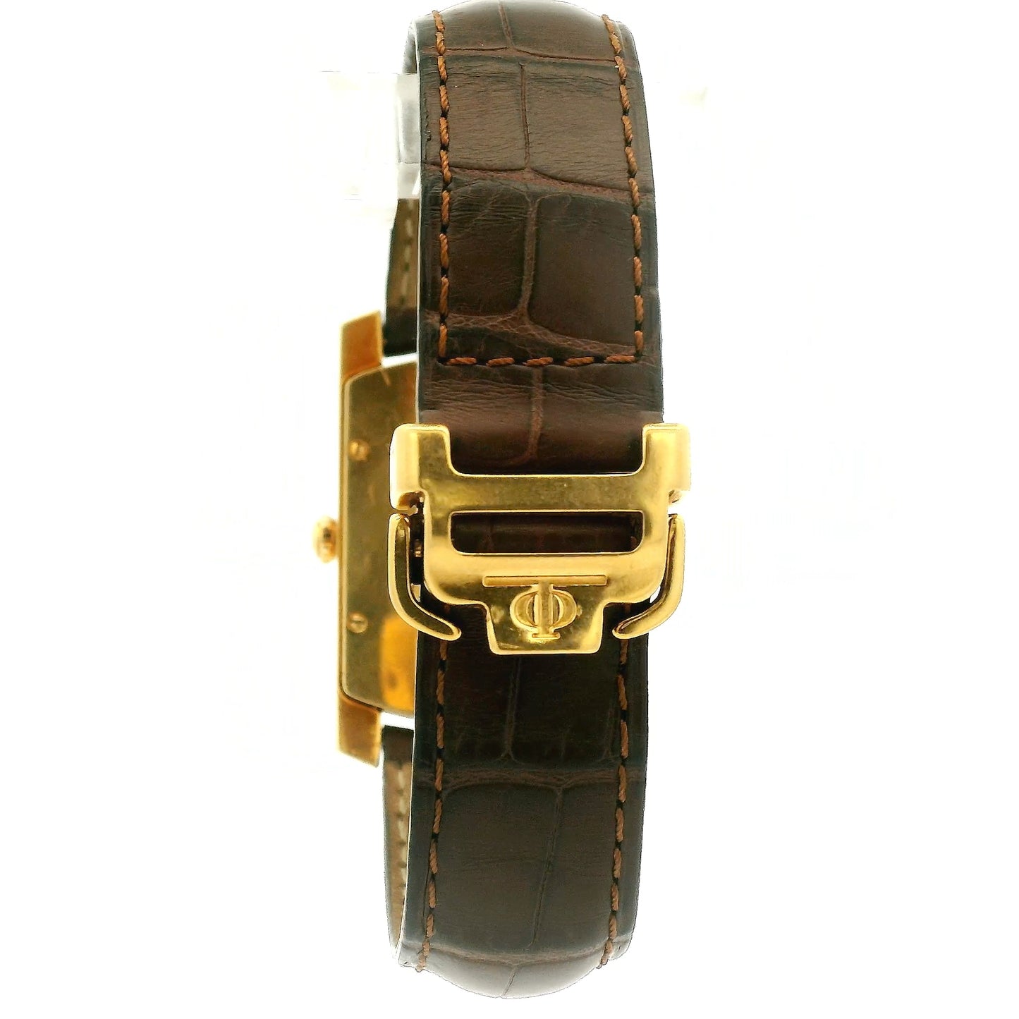 A Vintage Baume & Mercier watch with a 18k gold rectangular case, cream dial with 9, 12 & 3 displayed, the dial is stamped with a tiffany & Co., and dark brown leather strap, shown against a plain white background at Forever Rox Fine Jewelry, Lake Tahoes Best Jewelry Store