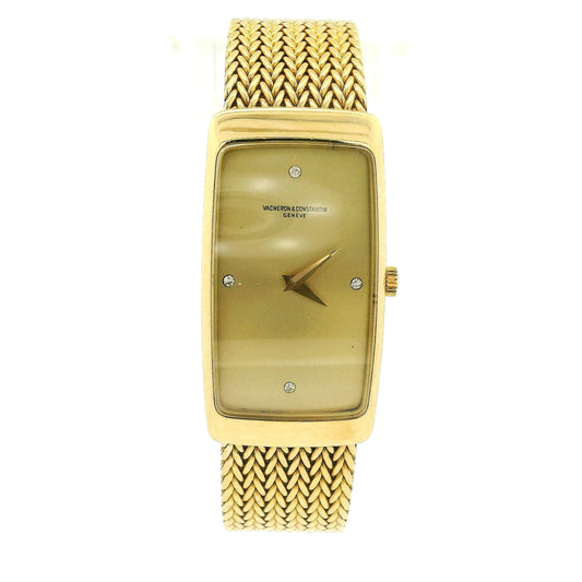A vintage 18k yellow gold women's Vacheron Constantin watch with a rectangular bezel, gold dial, and a matching gold mesh bracelet, shown against a plain white background at Forever Rox Fine Jewelry, Lake Tahoes Best Jewelry Store