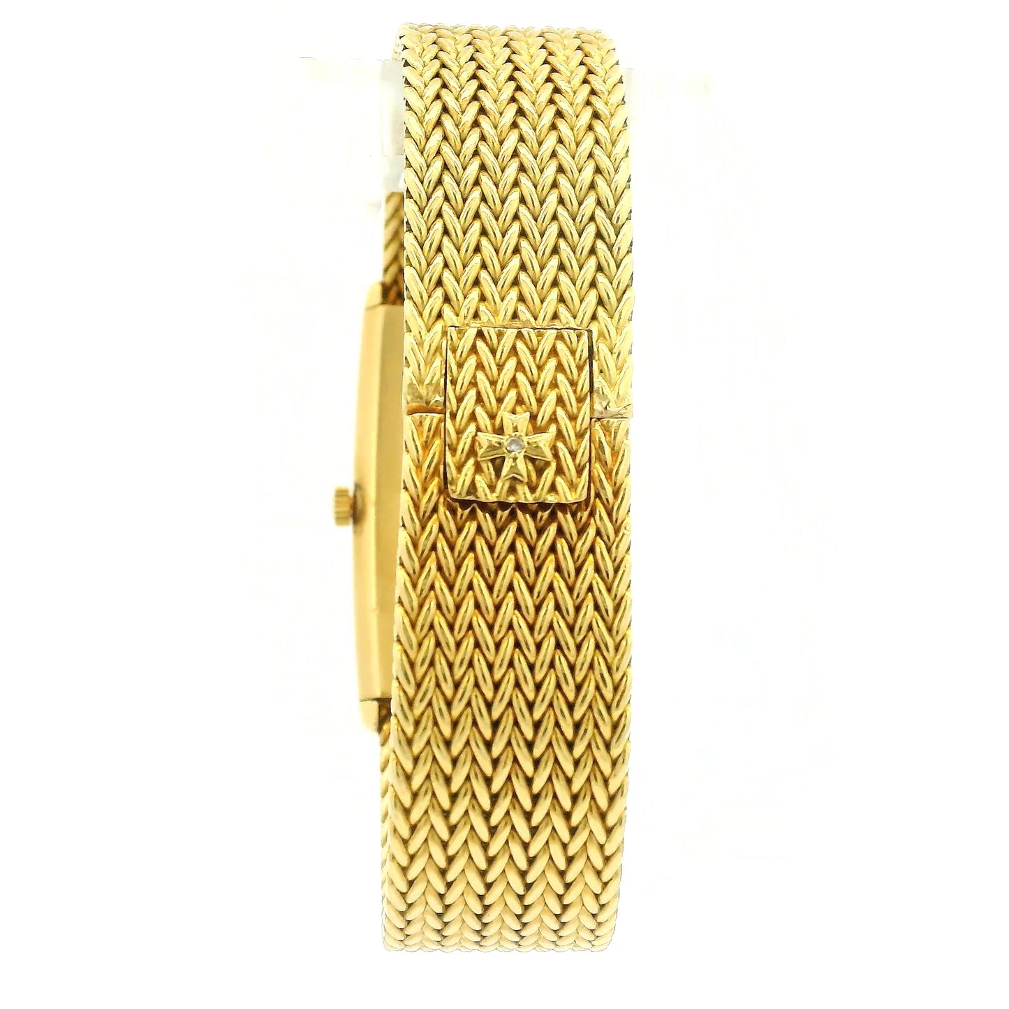 A vintage 18k yellow gold women's Vacheron Constantin watch with a rectangular bezel, gold dial, and a matching gold mesh bracelet, shown against a plain white background at Forever Rox Fine Jewelry, Lake Tahoes Best Jewelry Store