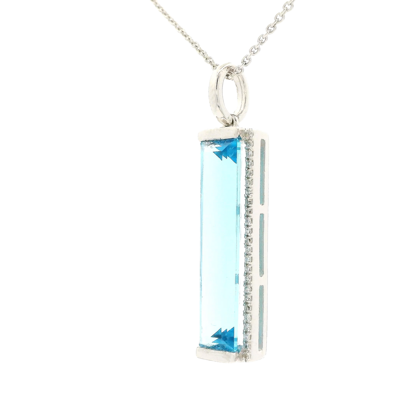 Enlongated Emerald Cut Swiss Blue Topaz & Diamond Pendant