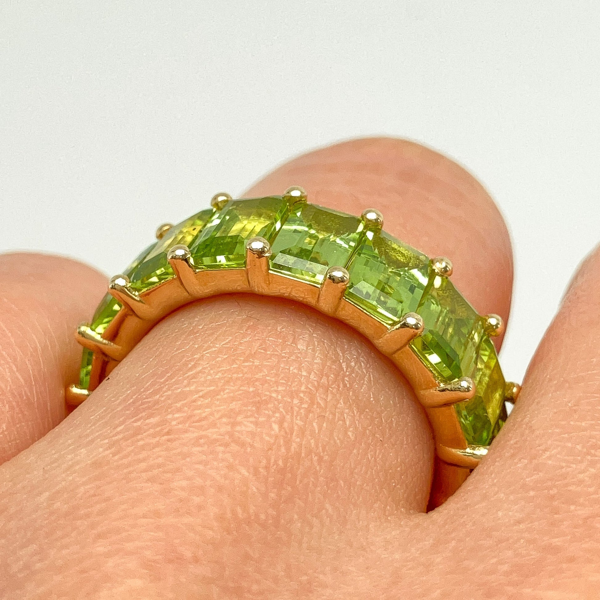 9.72cts Peridot Emerald Cut Eternity Band, 18k - Forever Rox Fine Jewelry