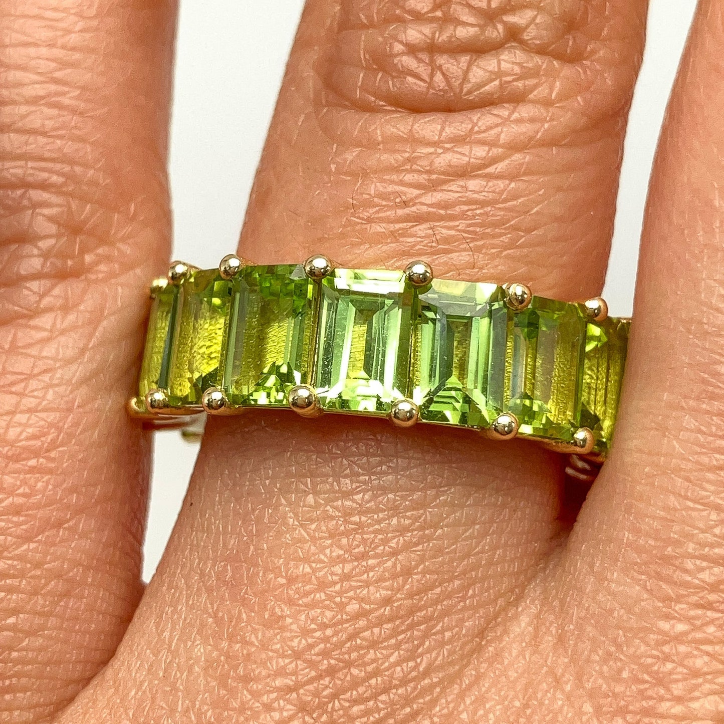 9.72cts Peridot Emerald Cut Eternity Band, 18k - Forever Rox Fine Jewelry