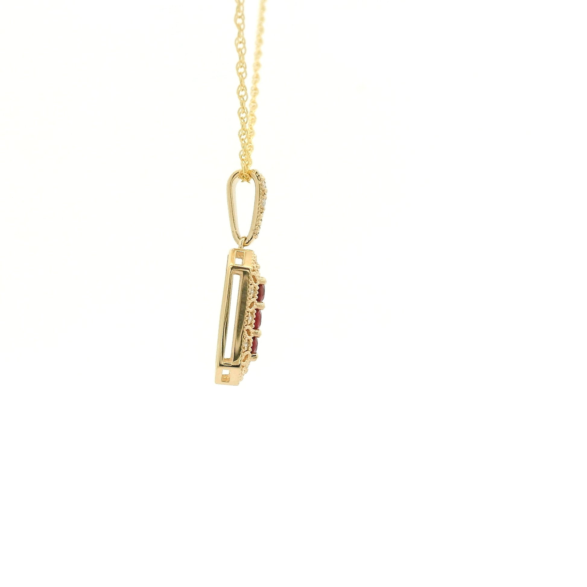 Yellow Gold Pendant with 3 prong set round cut natural Rubies in the center filigree design and diamonds at Forever Rox Fine Jewelry, Lake Tahoes Best Jewelry Store