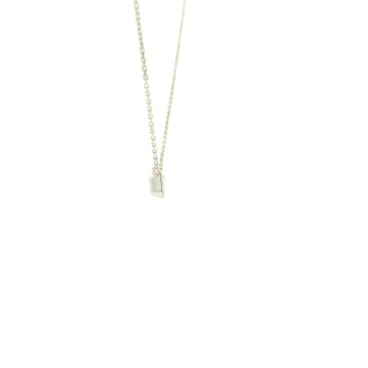 A White Gold Pendant with a bezel set emerald cut natural Diamond in the center at Forever Rox Fine Jewelry, Lake Tahoes Best Jewelry Store
