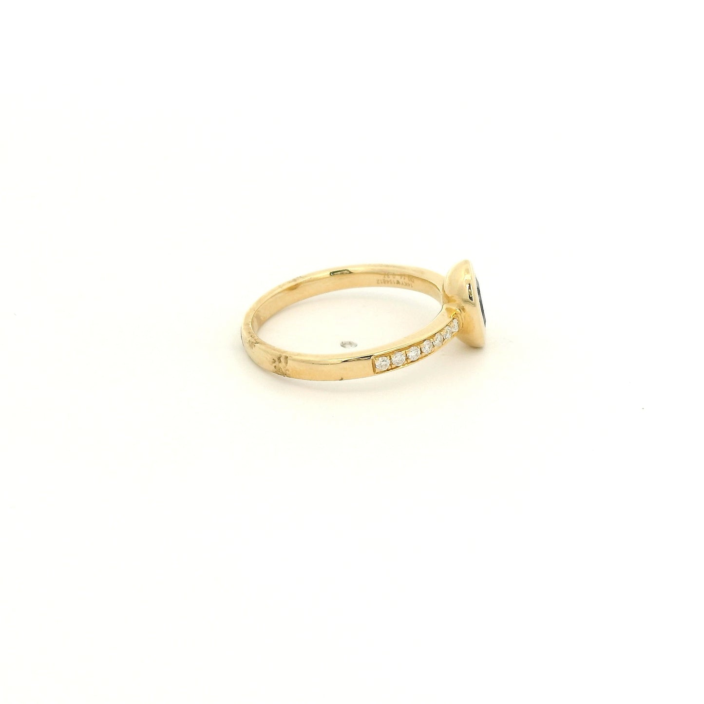 A Yellow Gold Ring with a bezel set oval cut natural Amethyst in the center with diamonds down the shank at Forever Rox Fine Jewelry, Lake Tahoes Best Jewelry Store