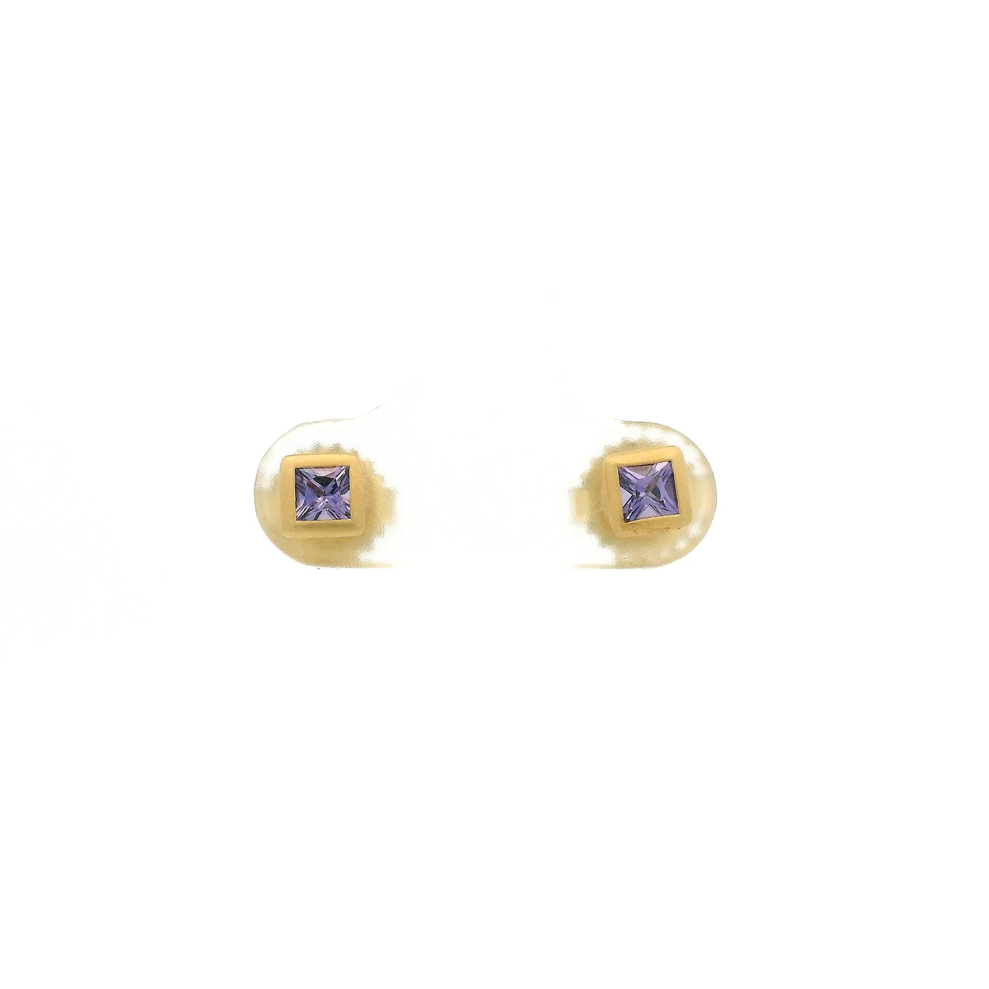 A Pair of Yellow Gold Stud Earrings with bezel set princess cut natural Purple Sapphire in the center at Forever Rox Fine Jewelry, Lake Tahoes Best Jewelry Store