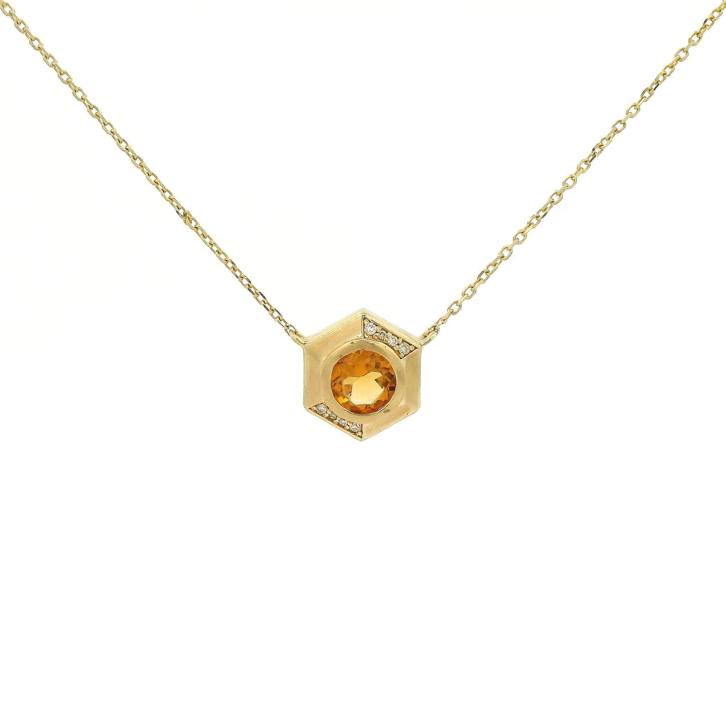 A Yellow Gold Octagon Pendant with a bezel set round cut natural Citrine in the center with diamonds and a chain attached at Forever Rox Fine Jewelry, Lake Tahoes Best Jewelry Store