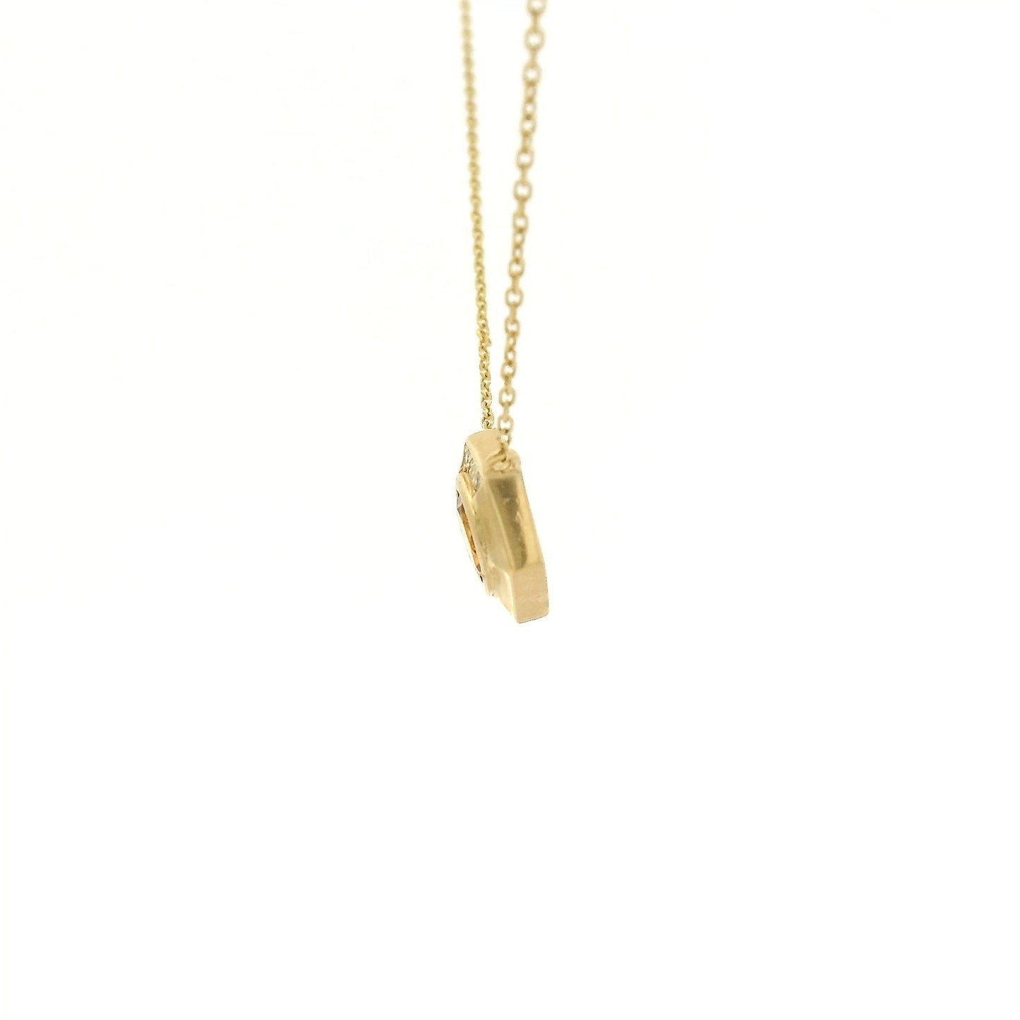 A Yellow Gold Octagon Pendant with a bezel set round cut natural Citrine in the center with diamonds and a chain attached at Forever Rox Fine Jewelry, Lake Tahoes Best Jewelry Store