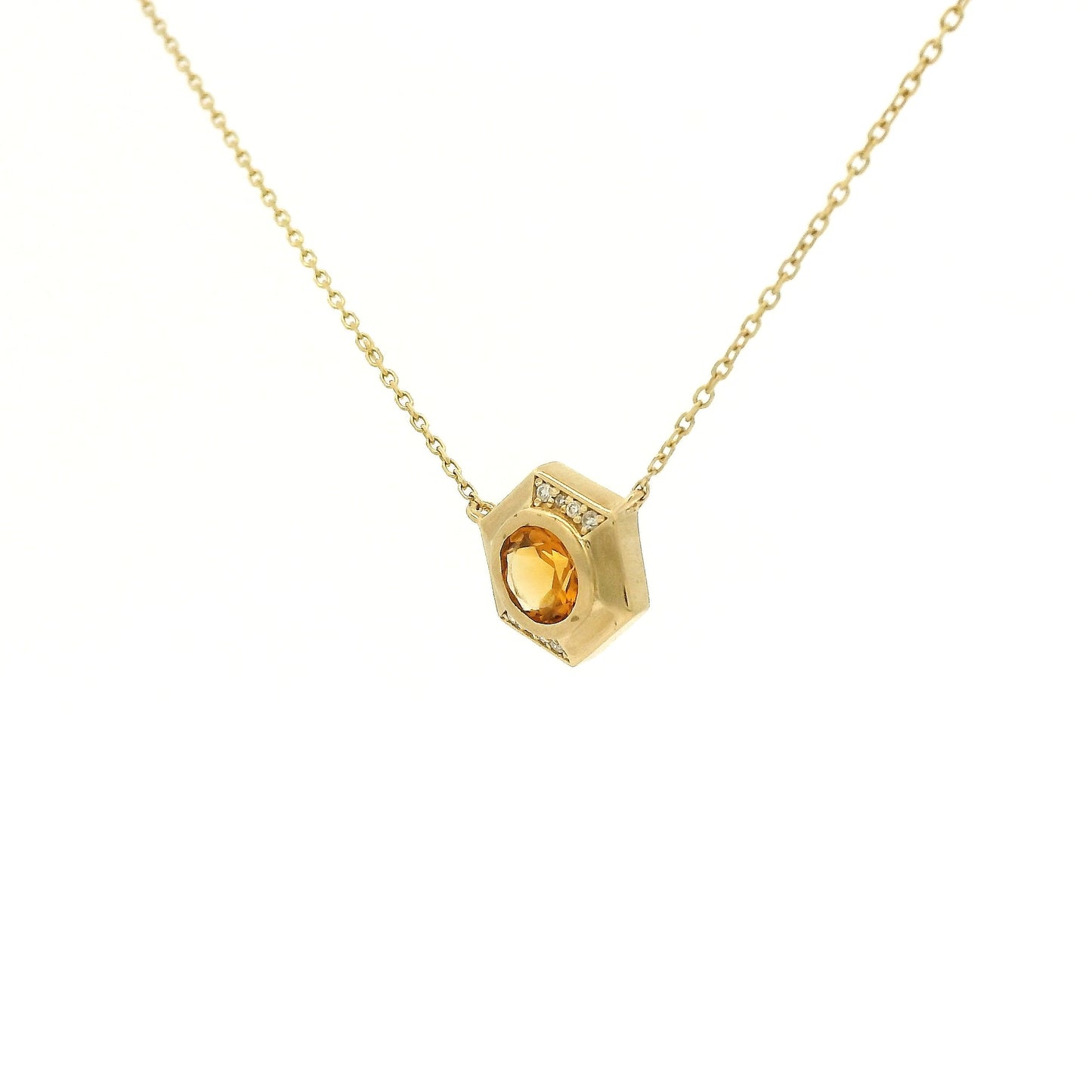 A Yellow Gold Octagon Pendant with a bezel set round cut natural Citrine in the center with diamonds and a chain attached at Forever Rox Fine Jewelry, Lake Tahoes Best Jewelry Store