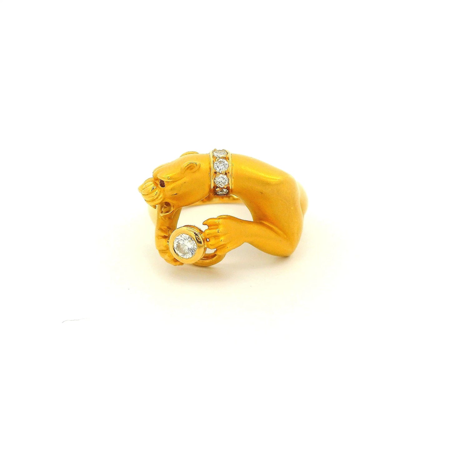 A Yellow Gold Ring Signed Carrera Y Carrera with a bezel set round cut natural Diamond in the center of the paws with a diamond collar and Ruby eye at Forever Rox Fine Jewelry, Lake Tahoes Best Jewelry Store
