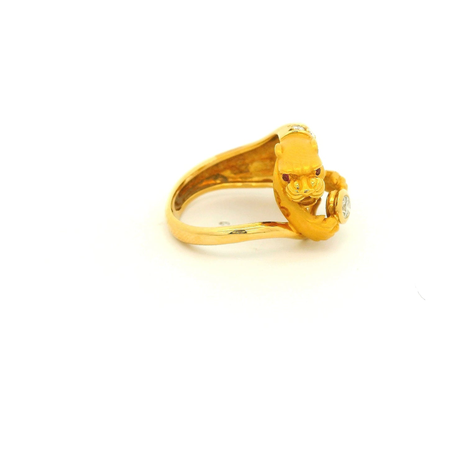 A Yellow Gold Ring Signed Carrera Y Carrera with a bezel set round cut natural Diamond in the center of the paws with a diamond collar and Ruby eye at Forever Rox Fine Jewelry, Lake Tahoes Best Jewelry Store
