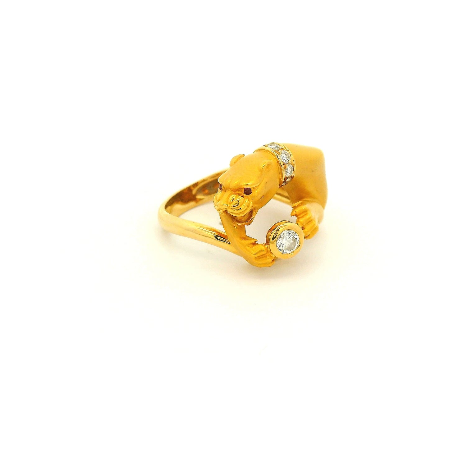A Yellow Gold Ring Signed Carrera Y Carrera with a bezel set round cut natural Diamond in the center of the paws with a diamond collar and Ruby eye at Forever Rox Fine Jewelry, Lake Tahoes Best Jewelry Store
