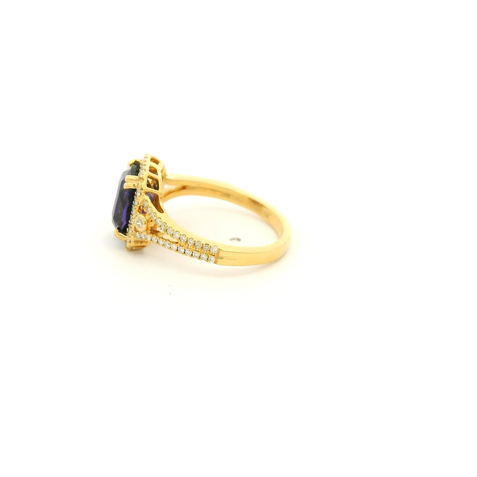 A Yellow Gold Ring with a prong set cushion cut NO Heat natural Purple Sapphire in the center with diamond accents at Forever Rox Fine Jewelry, Lake Tahoes Best Jewelry Store
