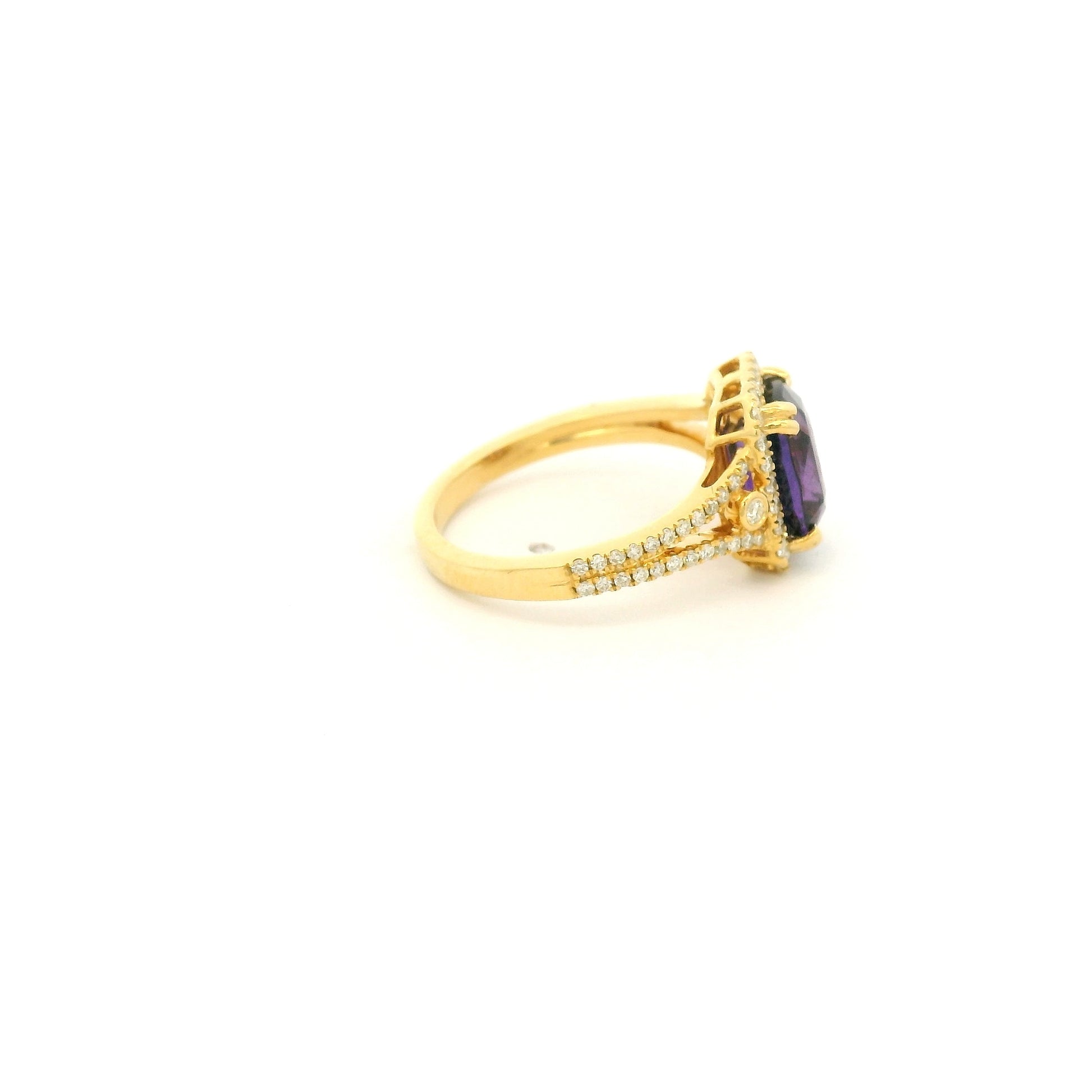 A Yellow Gold Ring with a prong set cushion cut NO Heat natural Purple Sapphire in the center with diamond accents at Forever Rox Fine Jewelry, Lake Tahoes Best Jewelry Store
