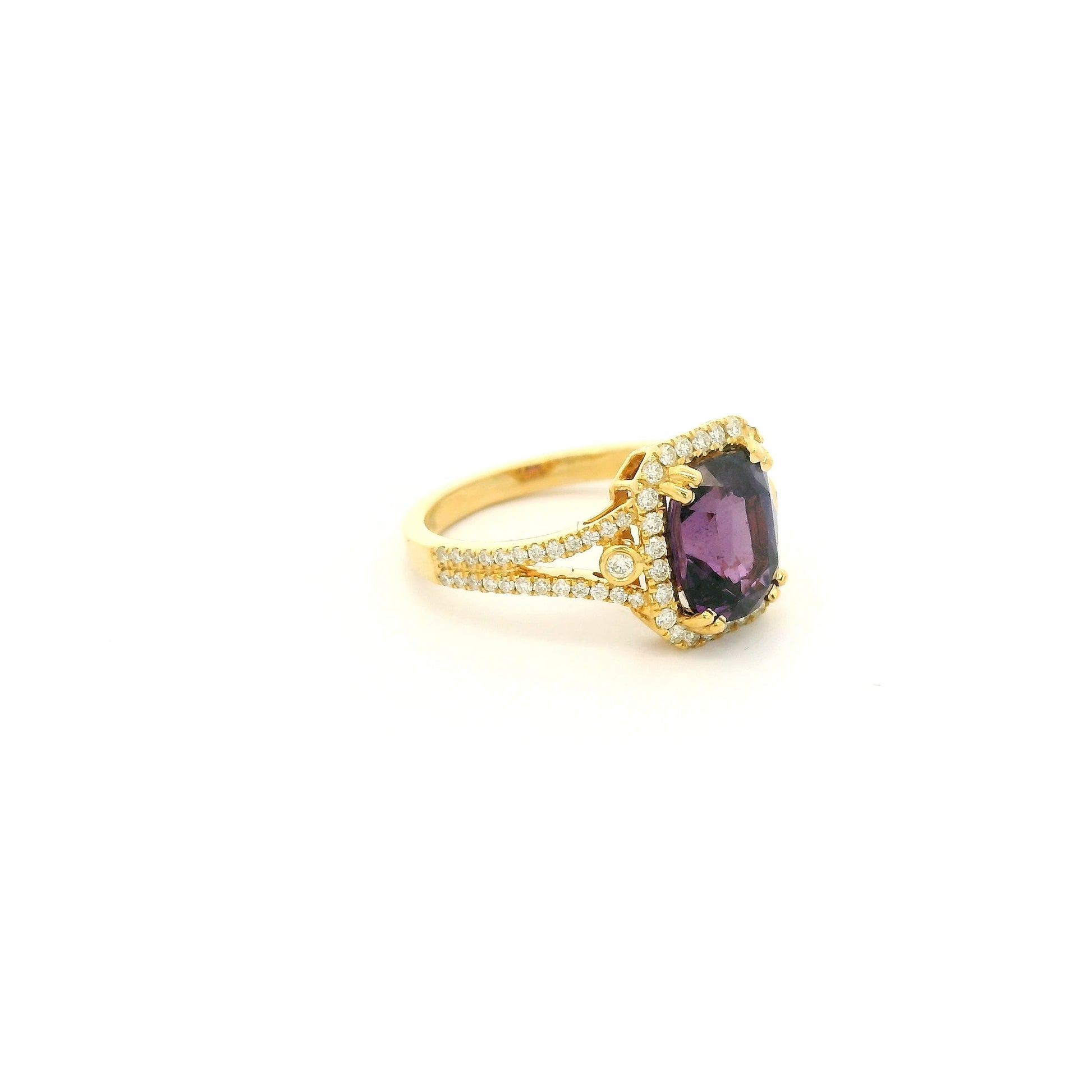 A Yellow Gold Ring with a prong set cushion cut NO Heat natural Purple Sapphire in the center with diamond accents at Forever Rox Fine Jewelry, Lake Tahoes Best Jewelry Store
