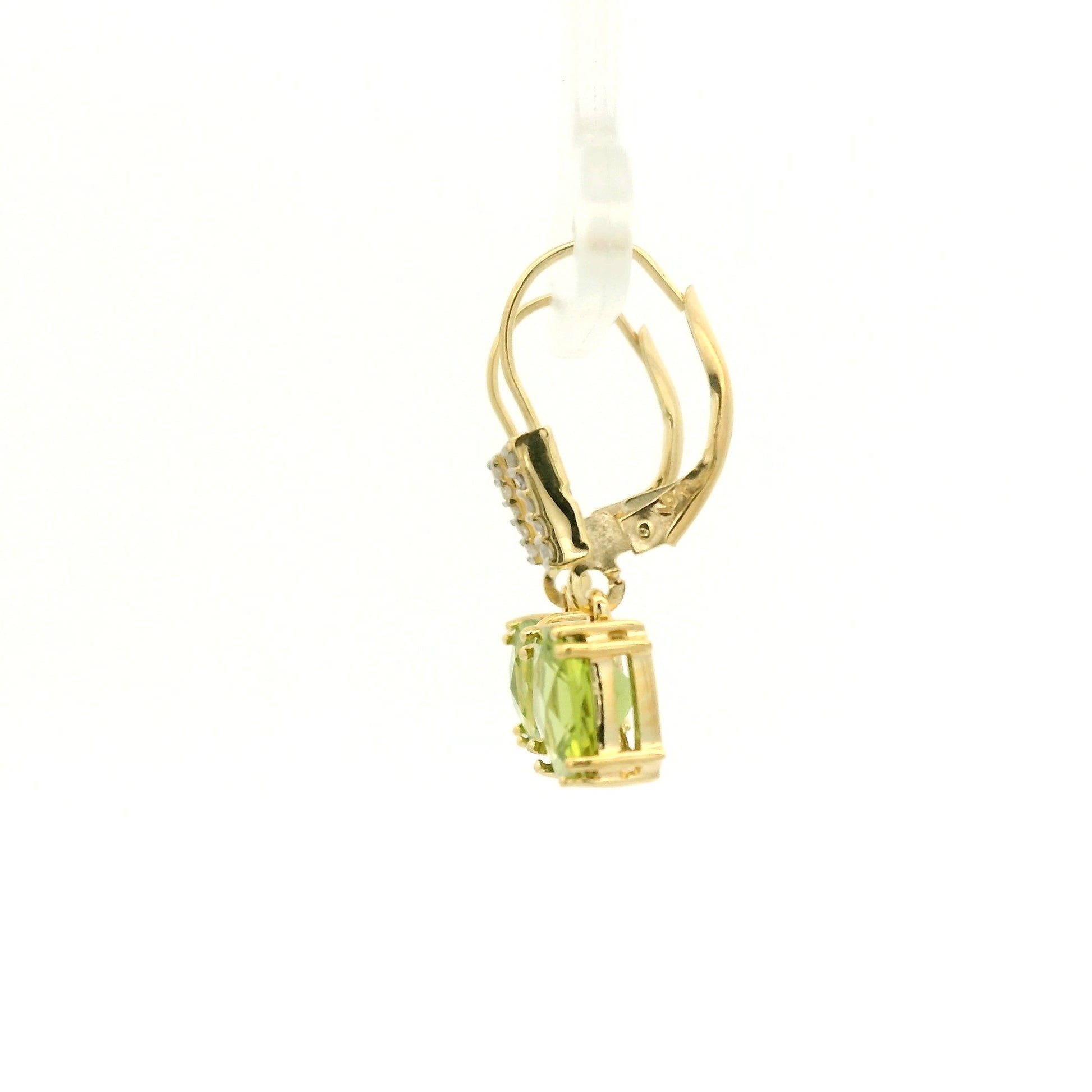 A Pair of Yellow Gold Dangle Earrings with prong set fancy cushion cut natural Peridots at the bottom with 4 diamonds dangle at Forever Rox Fine Jewelry, Lake Tahoes Best Jewelry Store
