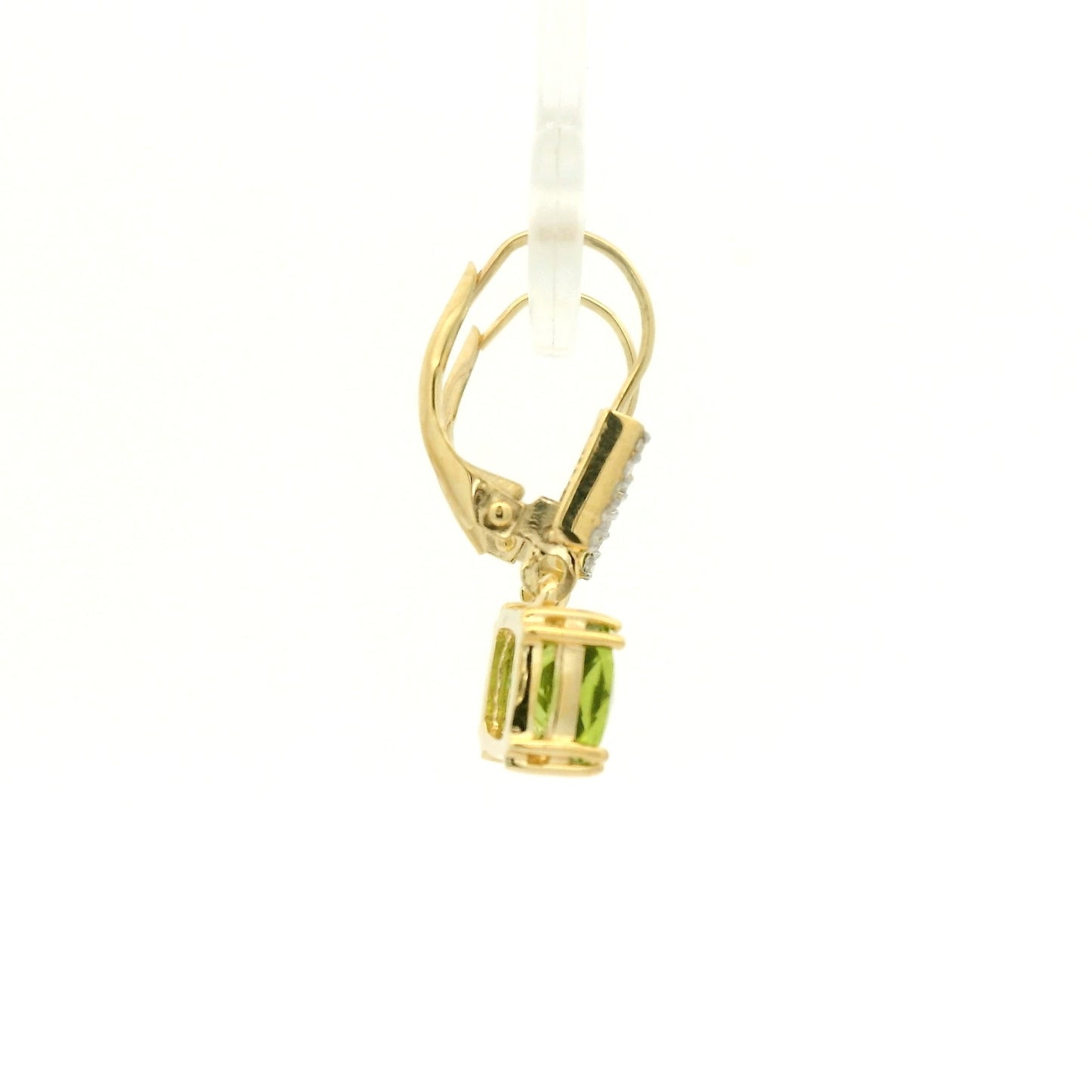 A Pair of Yellow Gold Dangle Earrings with prong set fancy cushion cut natural Peridots at the bottom with 4 diamonds dangle at Forever Rox Fine Jewelry, Lake Tahoes Best Jewelry Store
