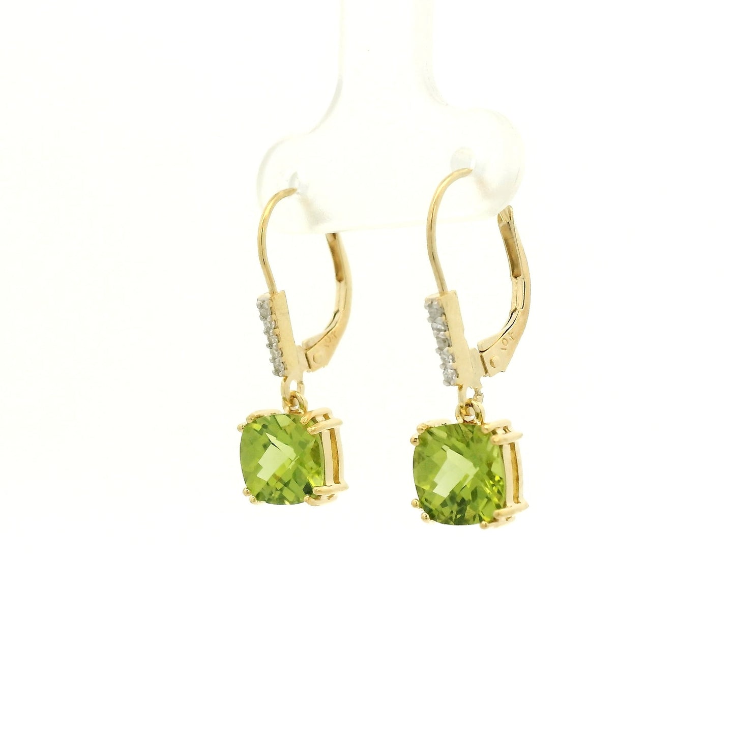 A Pair of Yellow Gold Dangle Earrings with prong set fancy cushion cut natural Peridots at the bottom with 4 diamonds dangle at Forever Rox Fine Jewelry, Lake Tahoes Best Jewelry Store
