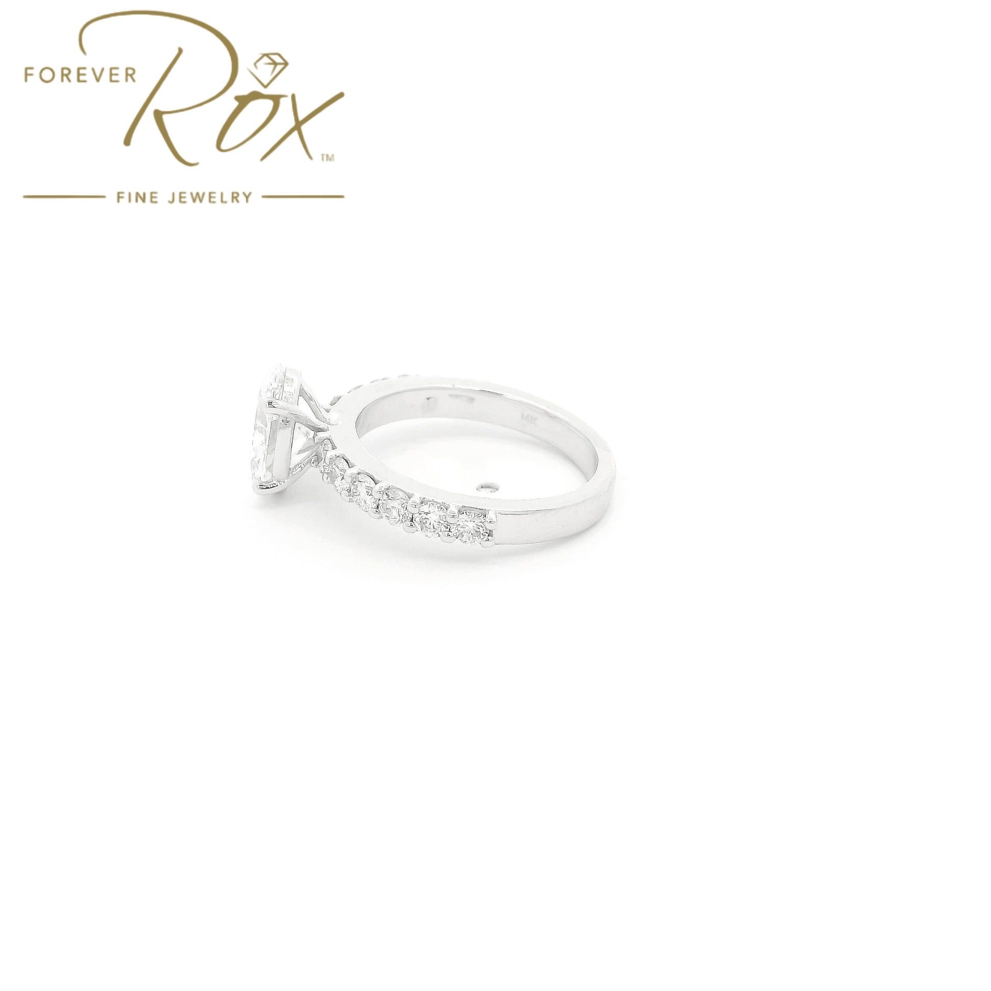 Custom 14k white gold oval diamond engagement ring with GIA certified 1.21ct D color SI1 natural diamond and 0.60ct diamond band by Forever Rox Fine Jewelry, Lake Tahoes Best Jewelry Store