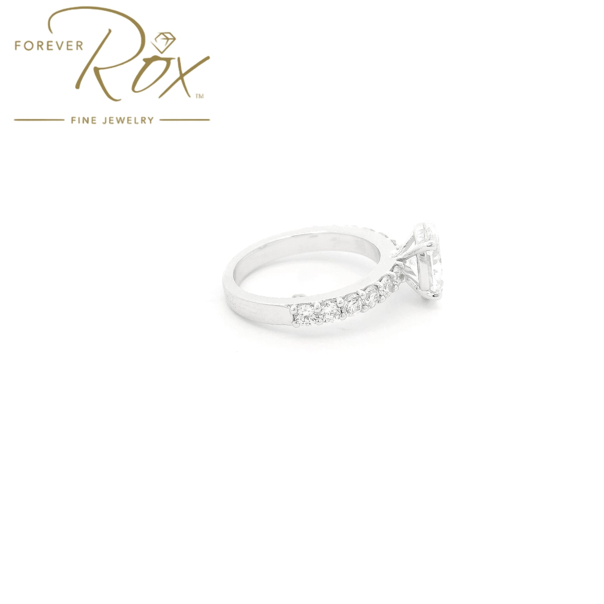 Custom 14k white gold oval diamond engagement ring with GIA certified 1.21ct D color SI1 natural diamond and 0.60ct diamond band by Forever Rox Fine Jewelry, Lake Tahoes Best Jewelry Store