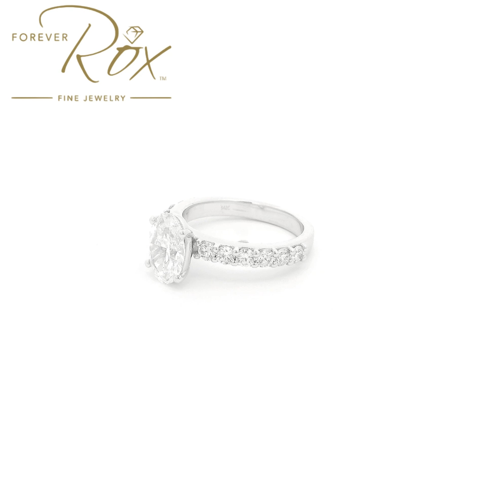 Custom 14k white gold oval diamond engagement ring with GIA certified 1.21ct D color SI1 natural diamond and 0.60ct diamond band by Forever Rox Fine Jewelry, Lake Tahoes Best Jewelry Store