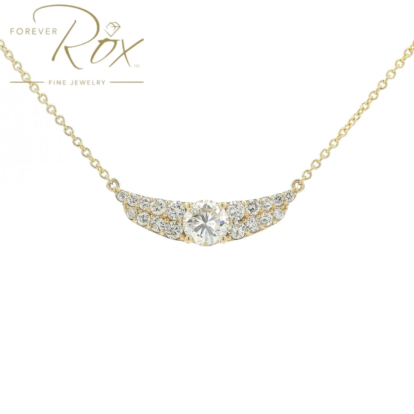 This custom pendant showcases a breathtaking 1.85 carat round brilliant-cut diamond at its center, gracefully set within a flowing curved design crafted in 14k yellow gold. Accented by a cascade of smaller diamonds along each side, the pendant creates a beautiful balance of brilliance and elegance. Designed to highlight the exceptional center stone, this timeless custom piece offers a refined look with sparkle from every angle.