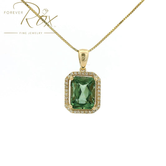A Yellow Gold Pendant with a prong set emerald cut natural Mint Tourmaline in the center with a halow of diamonds at Forever Rox Fine Jewelry, Lake Tahoes Best Jewelry Store