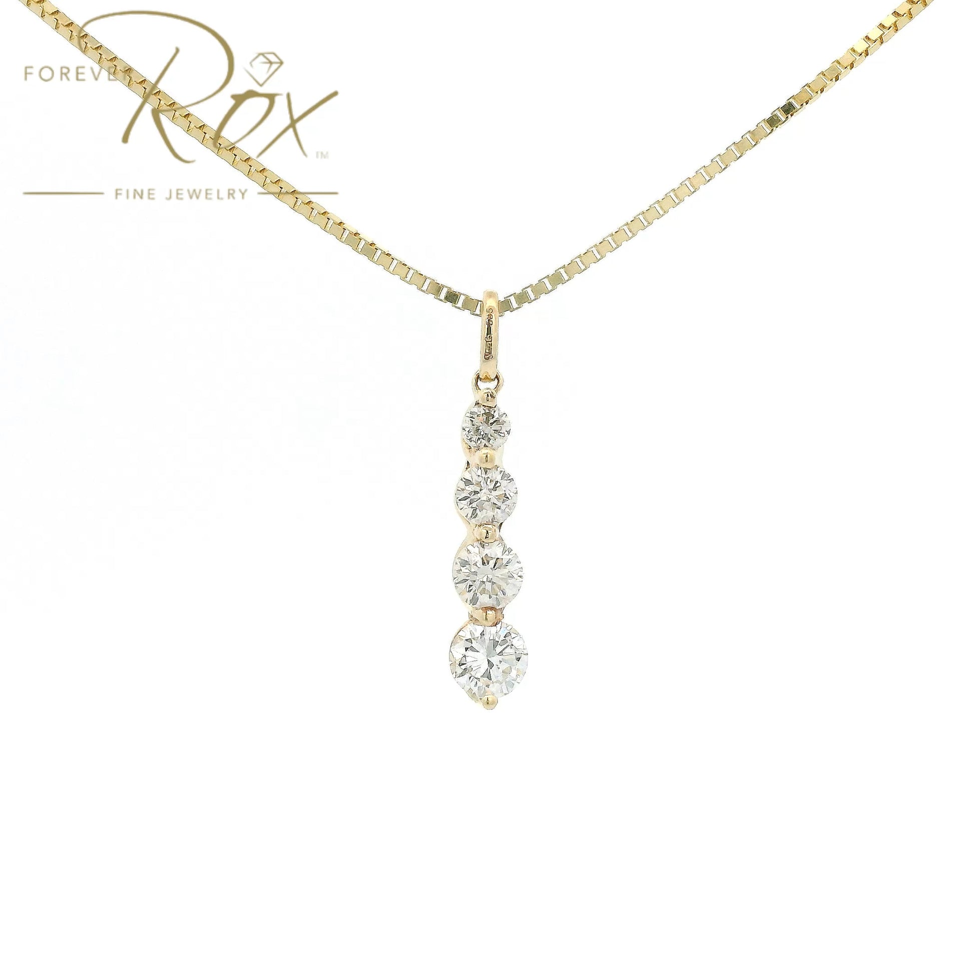 This custom pendant features four round brilliant-cut diamonds arranged in a graceful graduating design, creating a beautiful flow of sparkle from top to bottom. Expertly set in 14k yellow gold, the pendant combines timeless elegance with everyday wearability, allowing each diamond to shine while showcasing the warmth of the gold.