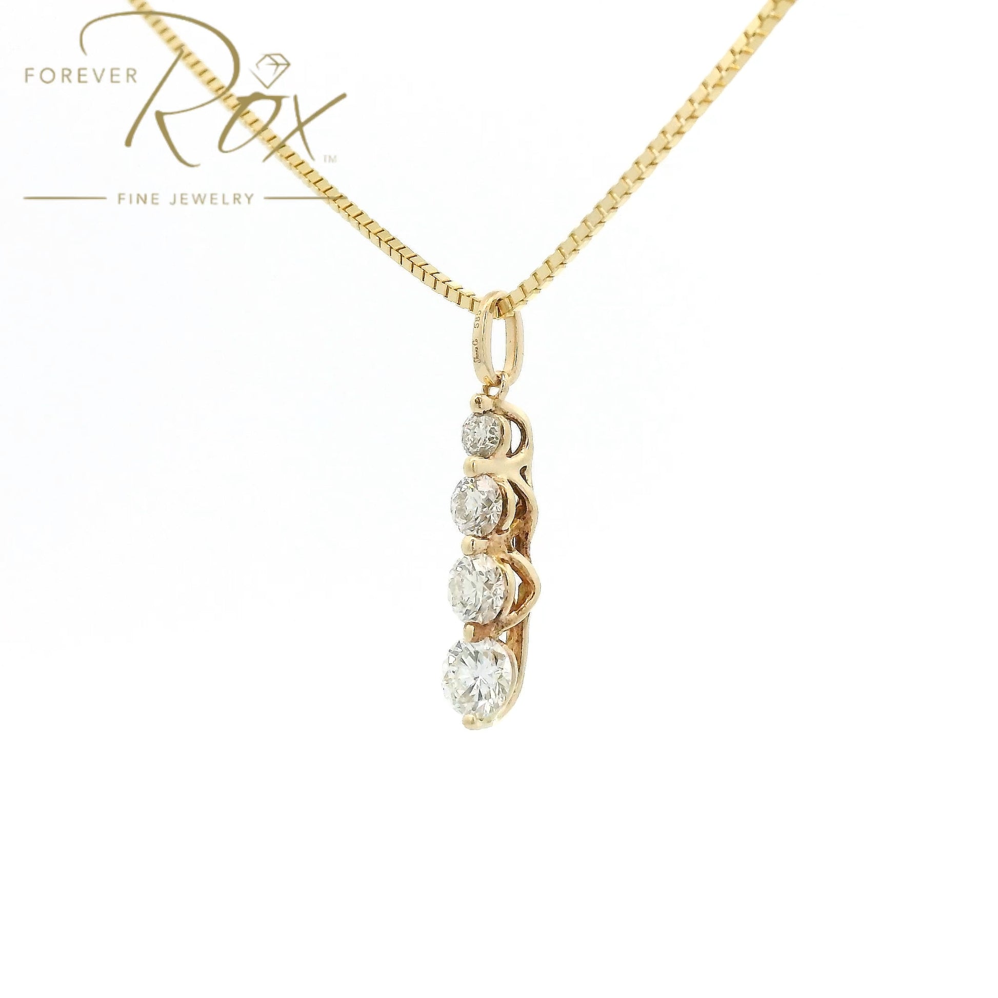 This custom pendant features four round brilliant-cut diamonds arranged in a graceful graduating design, creating a beautiful flow of sparkle from top to bottom. Expertly set in 14k yellow gold, the pendant combines timeless elegance with everyday wearability, allowing each diamond to shine while showcasing the warmth of the gold.