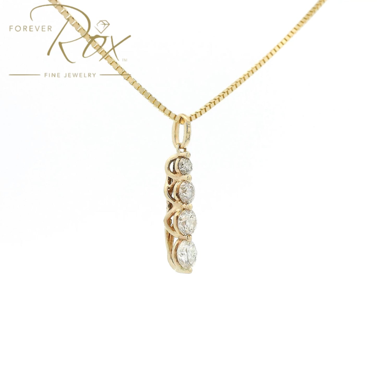 This custom pendant features four round brilliant-cut diamonds arranged in a graceful graduating design, creating a beautiful flow of sparkle from top to bottom. Expertly set in 14k yellow gold, the pendant combines timeless elegance with everyday wearability, allowing each diamond to shine while showcasing the warmth of the gold.