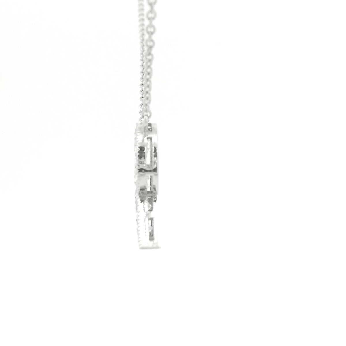 A White Gold Letter R Pendant with Diamonds at Forever Rox Fine Jewelry, Lake Tahoes Best Jewelry Store