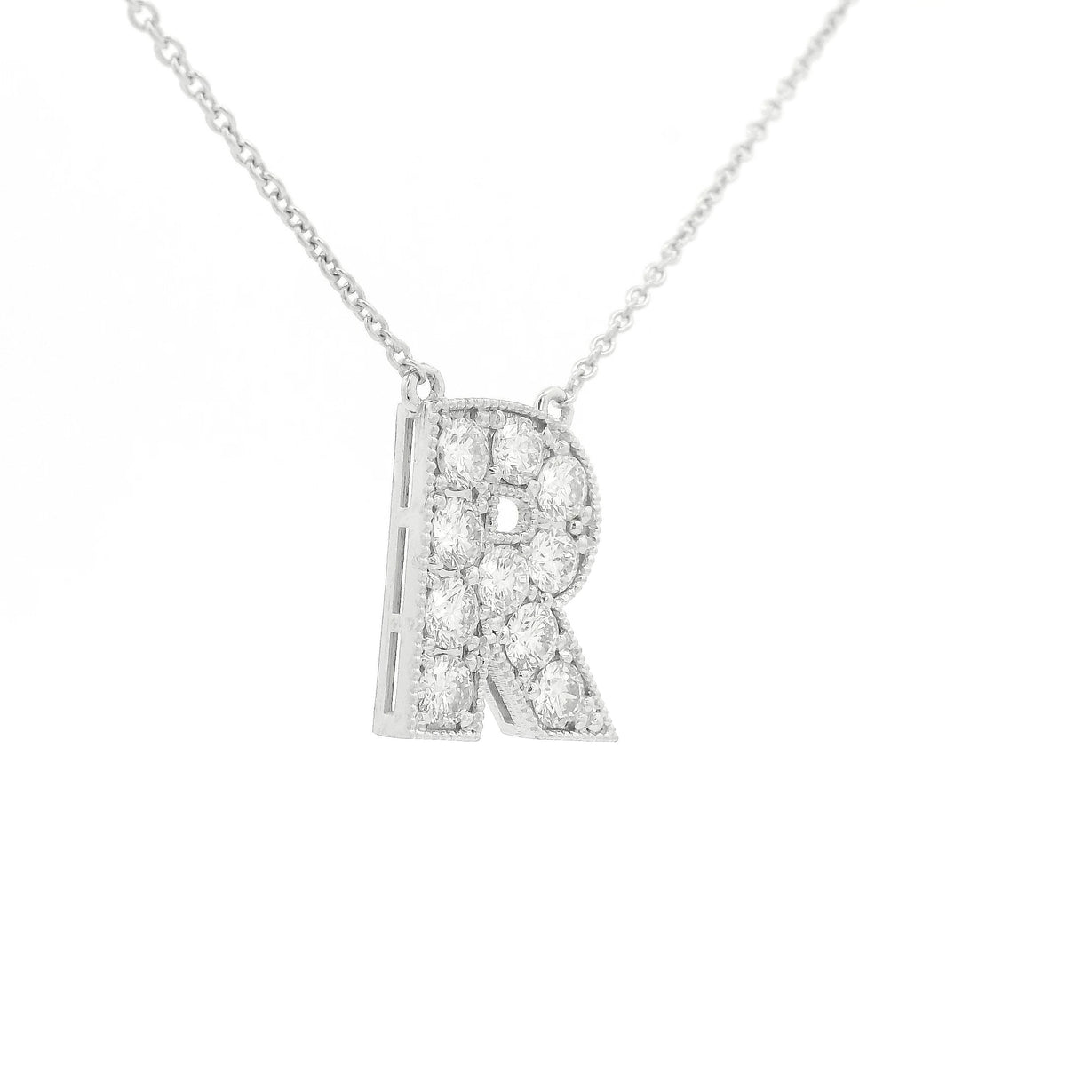 A White Gold Letter R Pendant with Diamonds at Forever Rox Fine Jewelry, Lake Tahoes Best Jewelry Store