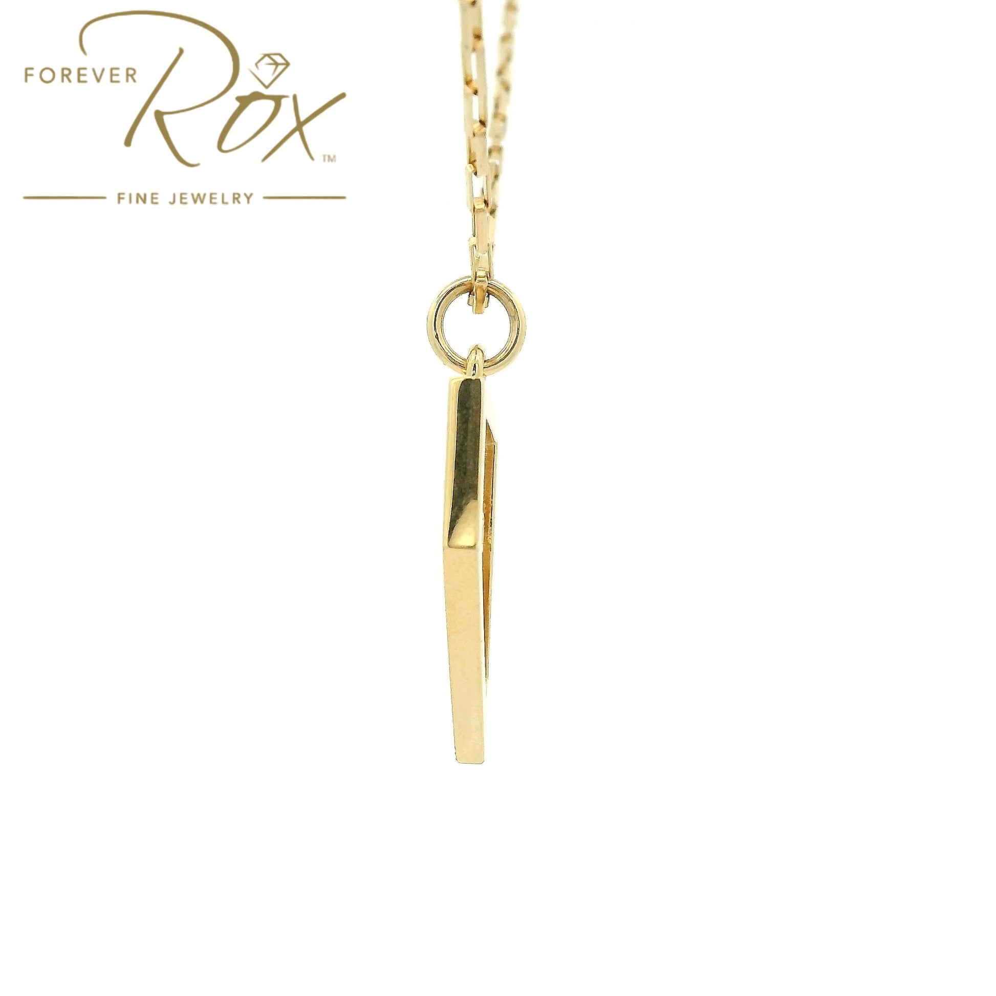 A Yellow Gold Nevada Outline Pendant with a bezel set round cut natural Diamond where Lake Tahoe is at Forever Rox Fine Jewelry, Lake Tahoes Best Jewelry Store