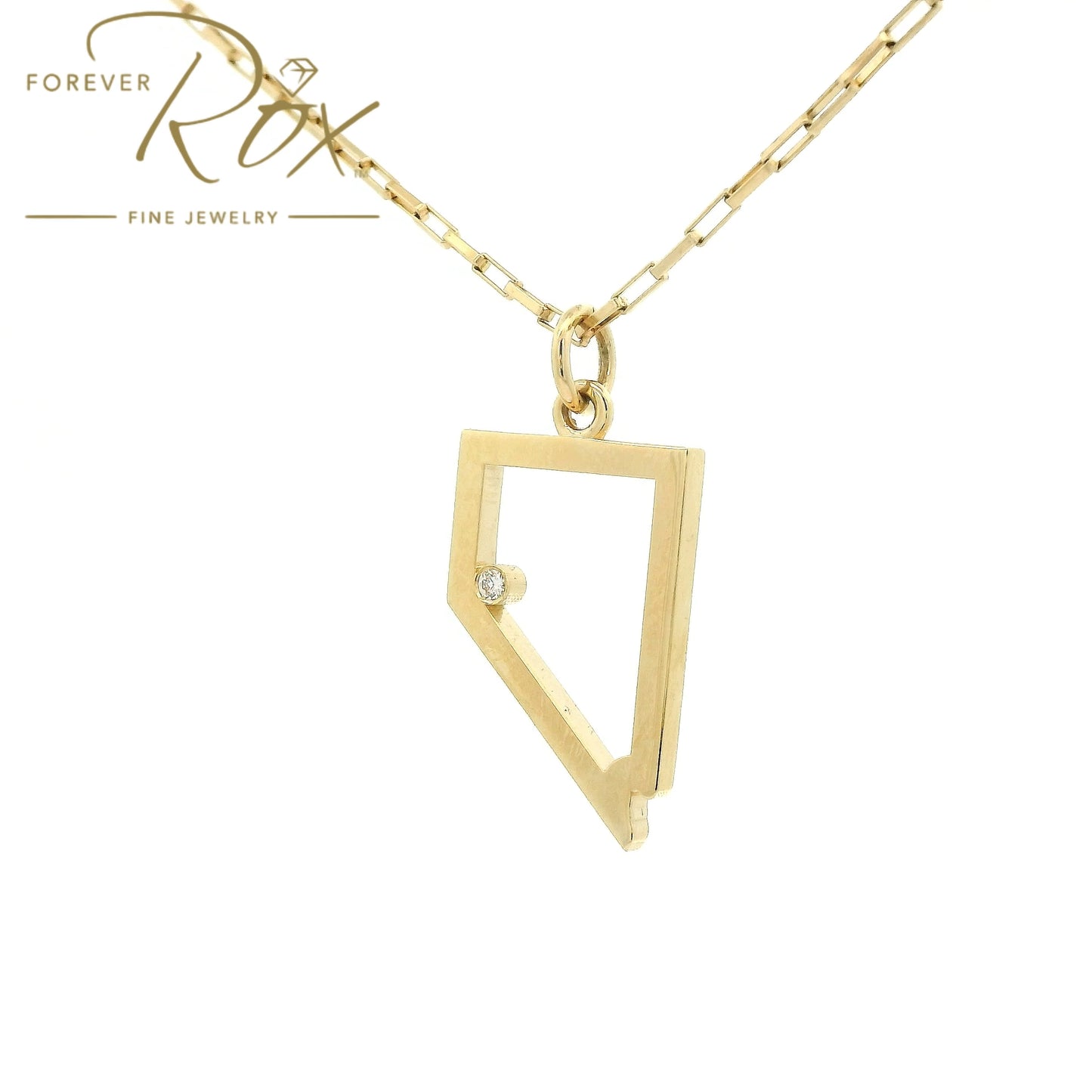 A Yellow Gold Nevada Outline Pendant with a bezel set round cut natural Diamond where Lake Tahoe is at Forever Rox Fine Jewelry, Lake Tahoes Best Jewelry Store