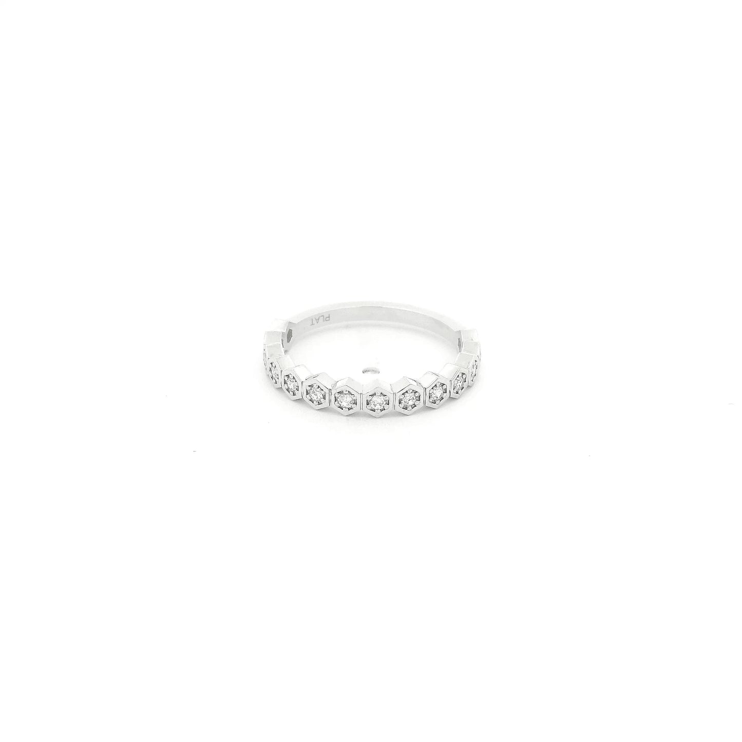 This custom platinum band features a striking row of octagon-shaped bezels, each framing a natural round brilliant cut diamond for a total of 0.18 carats of sparkle. Inspired by a matching design we carry in 14k yellow gold, this piece was custom crafted in platinum at the client’s request, giving the timeless silhouette a luxurious and enduring finish. The combination of geometric elegance, natural diamonds, and platinum’s exceptional durability makes this band a beautiful expression of personalized fine j