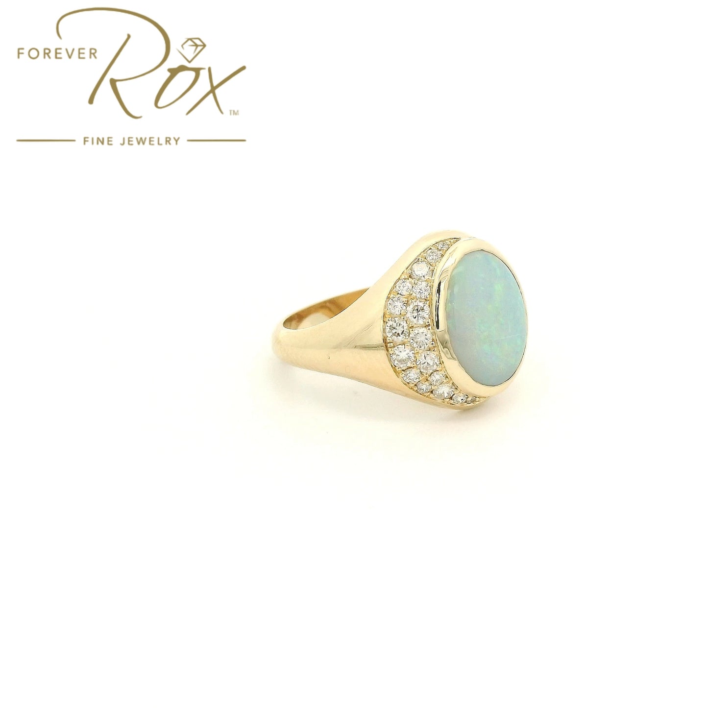 Custom 14k yellow gold oval opal ring with 0.24ctw diamond crescent moon and diamond star accents by Forever Rox Fine Jewelry, Lake Tahoes Best Jewelry Store