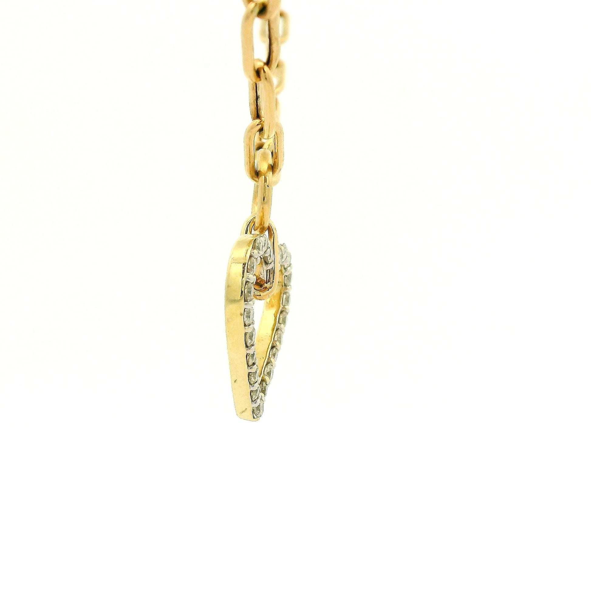A gold heart-shaped pendant necklace with a pavé diamond outline, suspended from a gold paperclip chain on a white background at Forever Rox Fine Jewelry, Lake Tahoes Best Jewelry Store