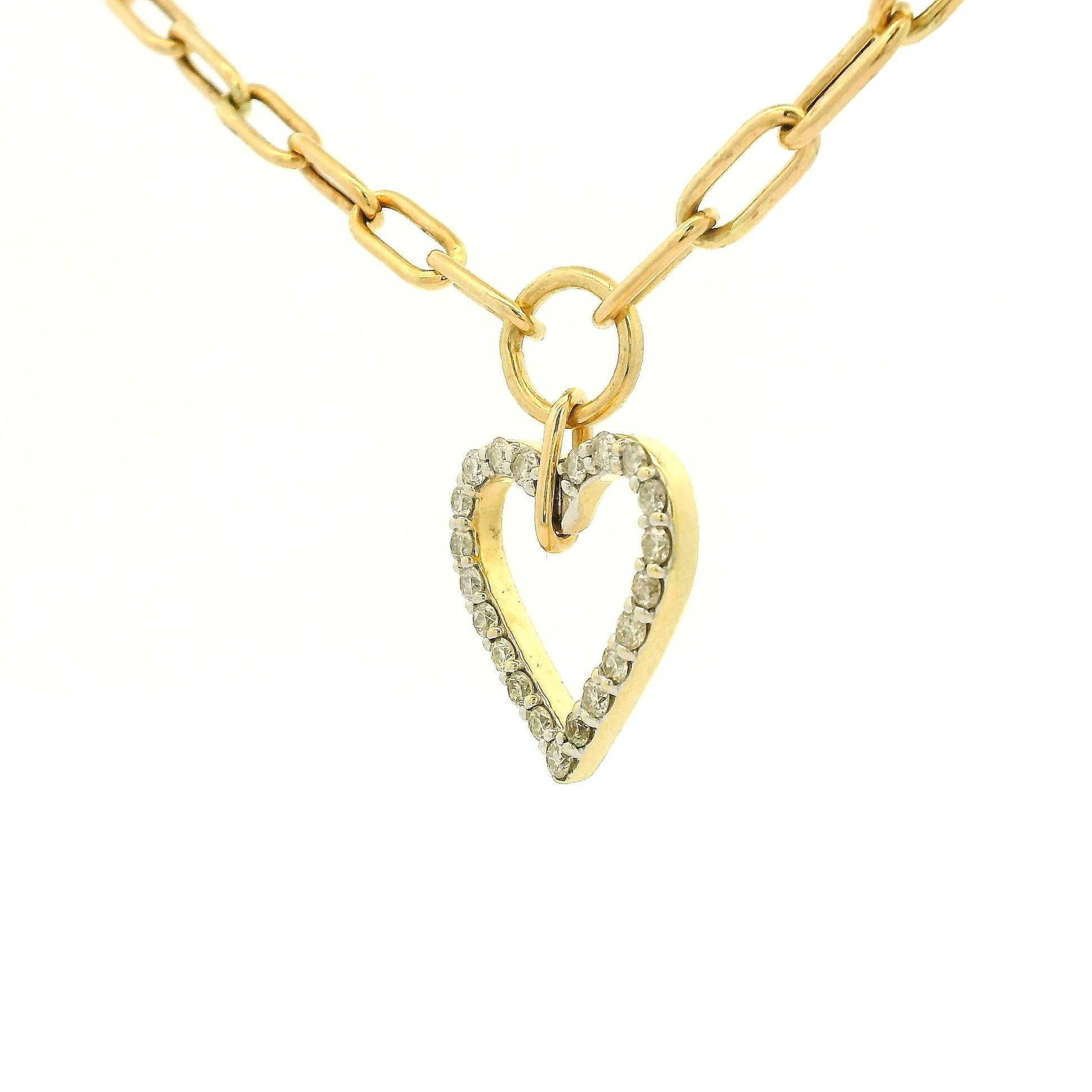 A gold heart-shaped pendant necklace with a pavé diamond outline, suspended from a gold paperclip chain on a white background at Forever Rox Fine Jewelry, Lake Tahoes Best Jewelry Store