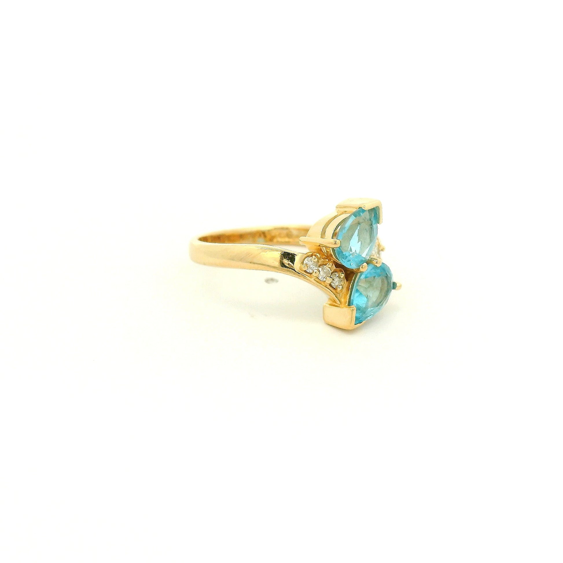 A Yellow Gold Ring with two pear cut natural Topaz with diamonds at Forever Rox Fine Jewelry, Lake Tahoes Best Jewelry Store