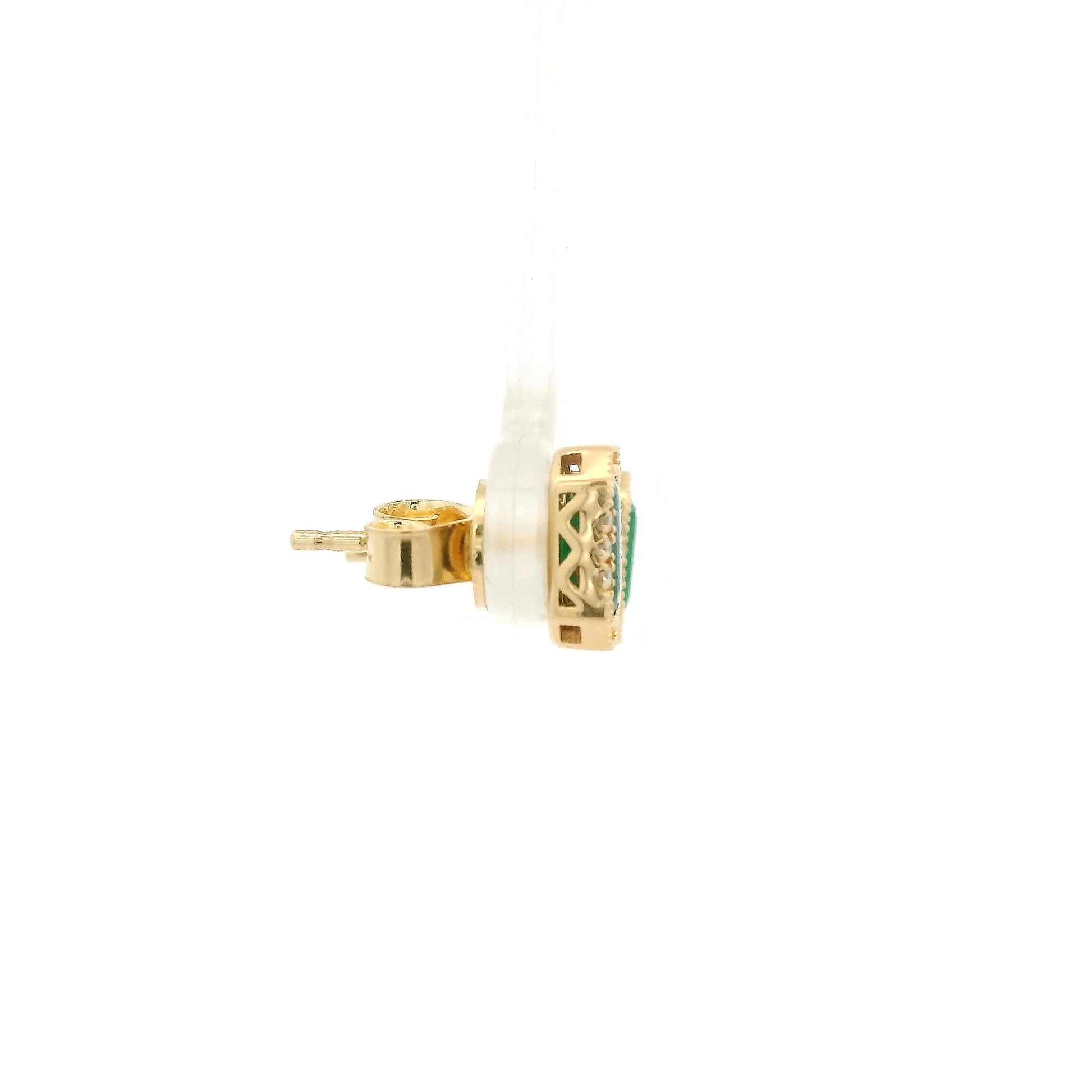 A Pair of Yellow Gold Earrings with a bezel set emerald cut natural Emerald in the center with a halo of diamonds at Forever Rox Fine Jewelry, Lake Tahoes Best Jewelry Store