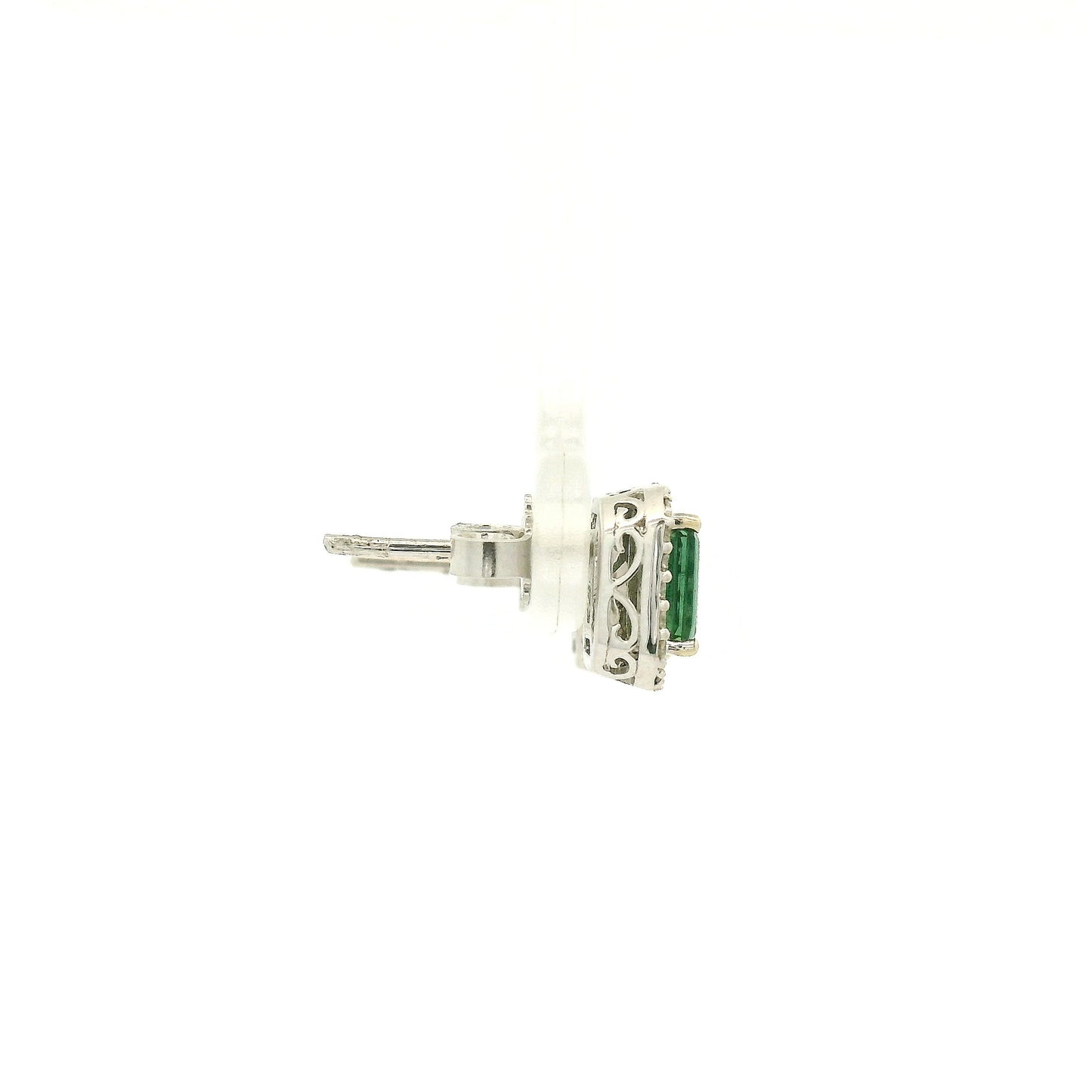 A Pair of White Gold Earrings with prong set emerald cut natural Green Tourmaline in the center with a diamond halo at Forever Rox Fine Jewelry, Lake Tahoes Best Jewelry Store