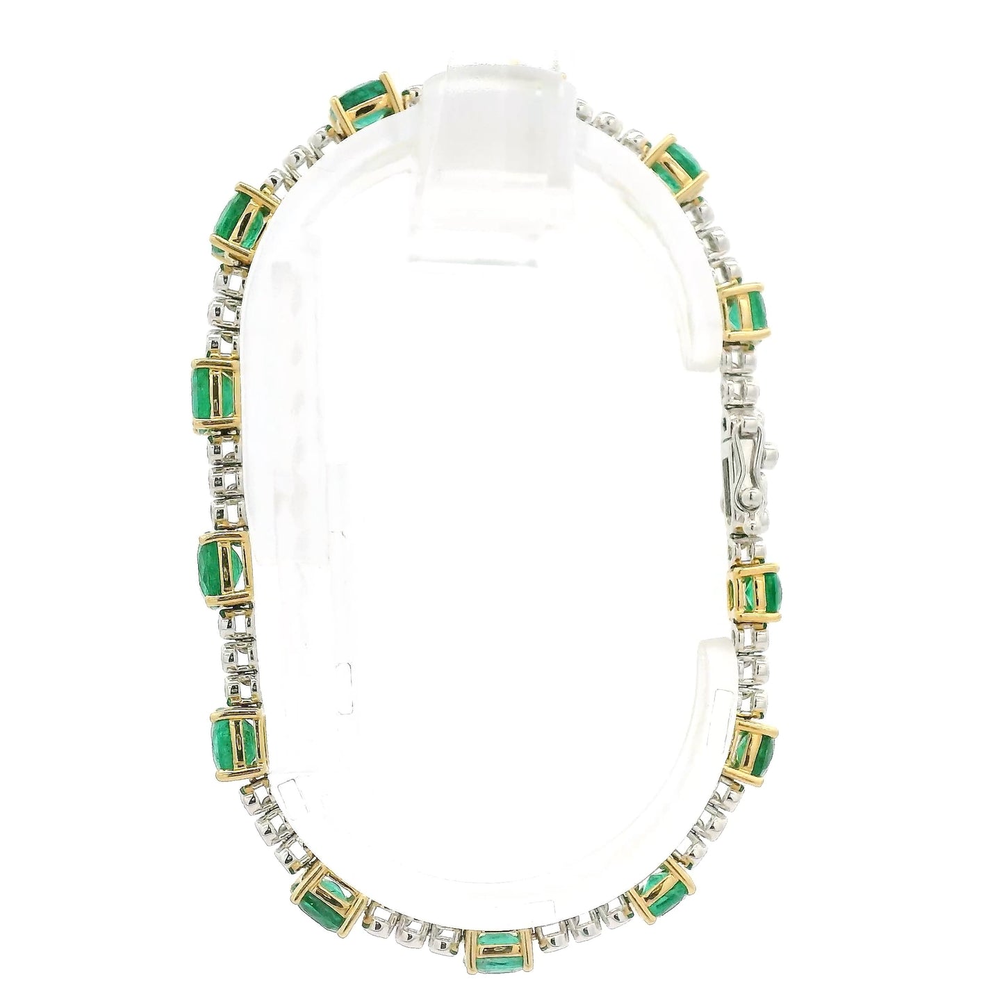 A Yellow Gold Tennis Bracelet with prong set cushion cut natural Emeralds alternating after every 3 natural bezel set diamonds at Forever Rox Fine Jewelry, Lake Tahoes Best Jewelry Store