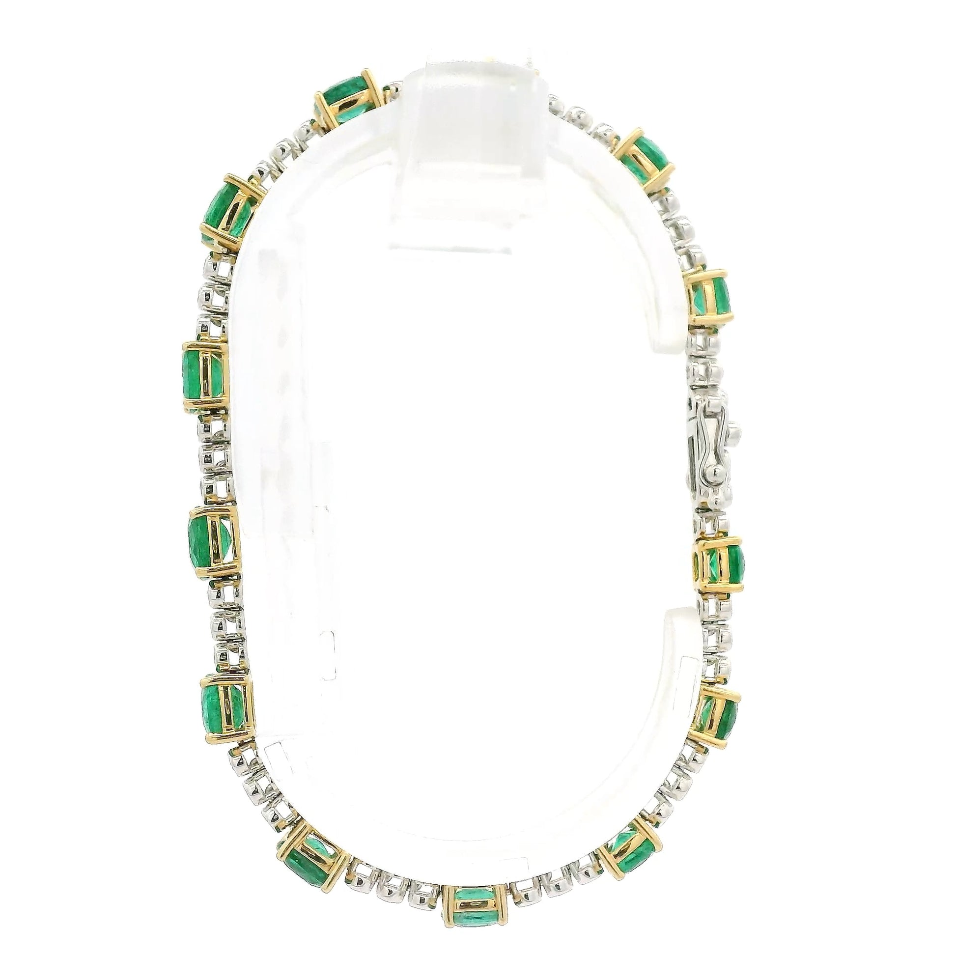 A Yellow Gold Tennis Bracelet with prong set cushion cut natural Emeralds alternating after every 3 natural bezel set diamonds at Forever Rox Fine Jewelry, Lake Tahoes Best Jewelry Store