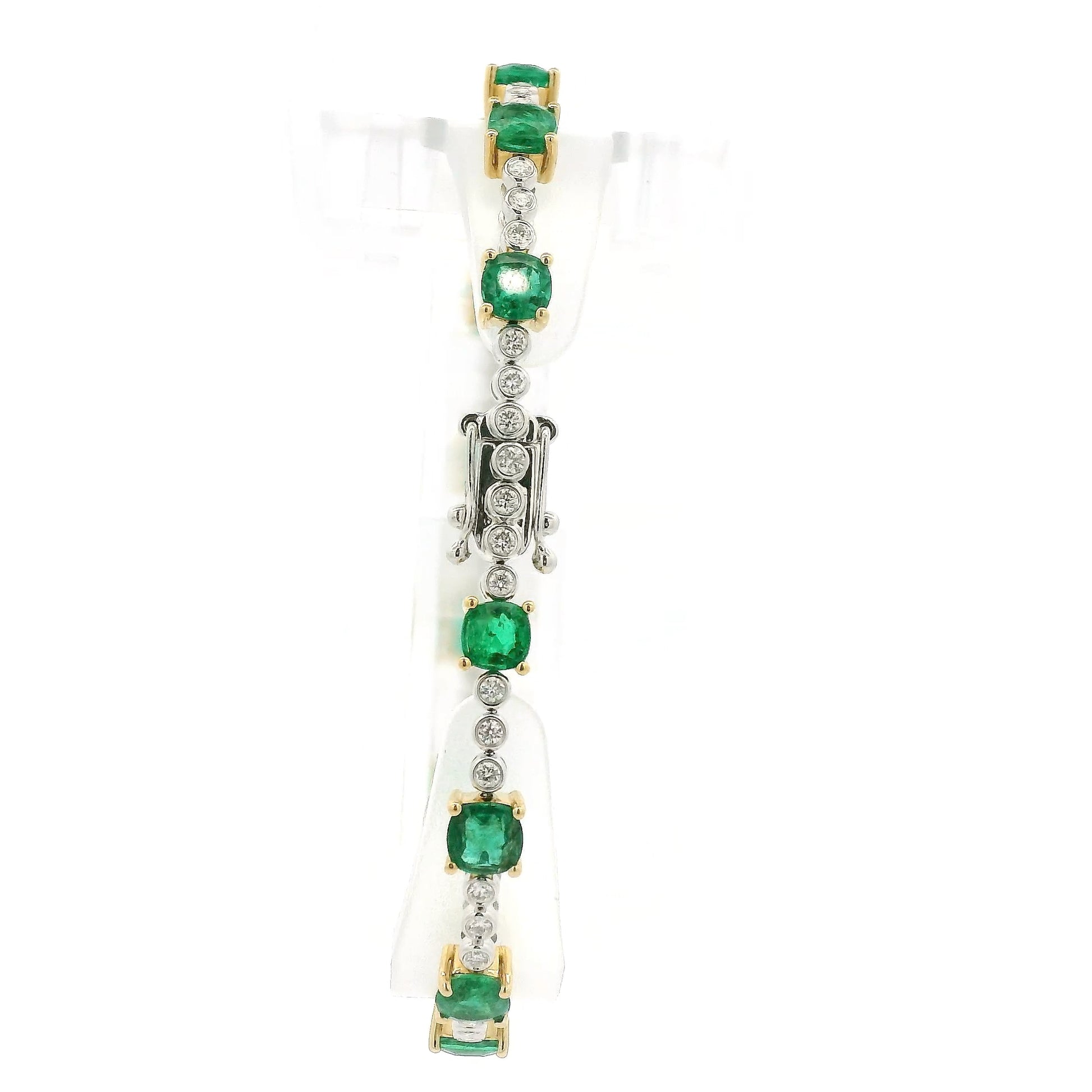 A Yellow Gold Tennis Bracelet with prong set cushion cut natural Emeralds alternating after every 3 natural bezel set diamonds at Forever Rox Fine Jewelry, Lake Tahoes Best Jewelry Store