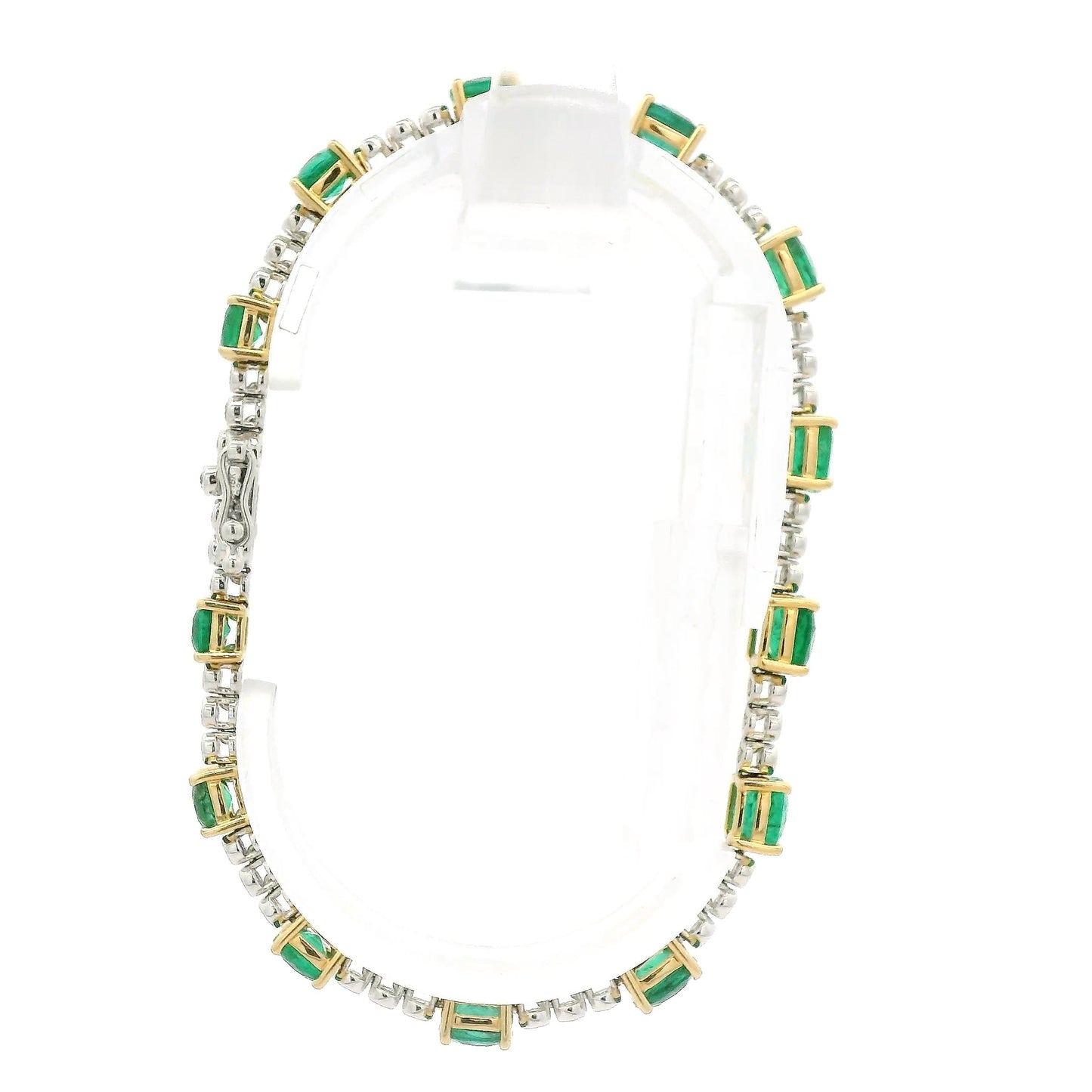A Yellow Gold Tennis Bracelet with prong set cushion cut natural Emeralds alternating after every 3 natural bezel set diamonds at Forever Rox Fine Jewelry, Lake Tahoes Best Jewelry Store