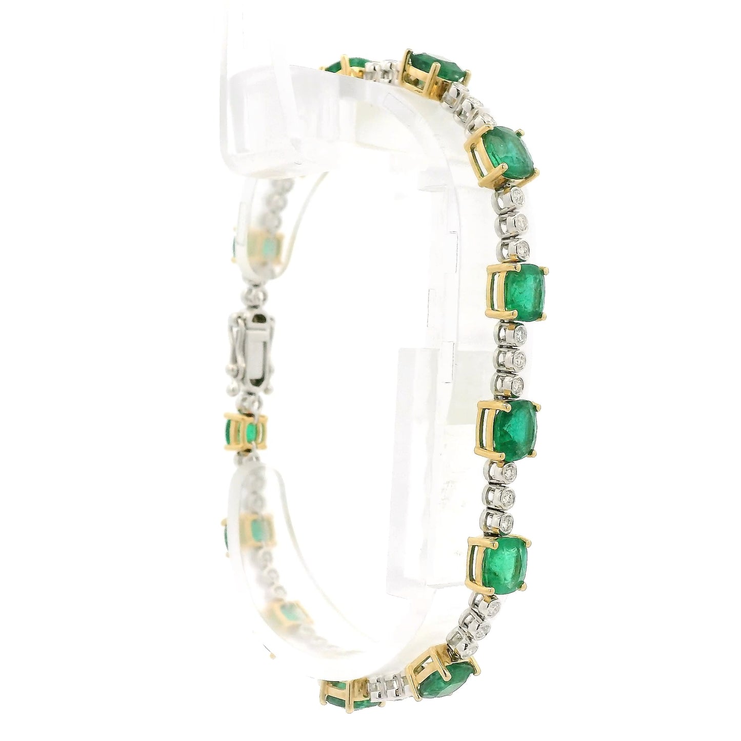 A Yellow Gold Tennis Bracelet with prong set cushion cut natural Emeralds alternating after every 3 natural bezel set diamonds at Forever Rox Fine Jewelry, Lake Tahoes Best Jewelry Store