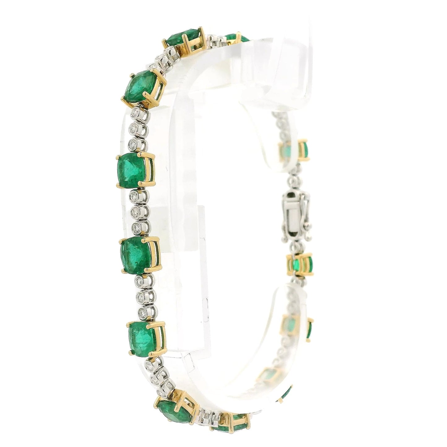 A Yellow Gold Tennis Bracelet with prong set cushion cut natural Emeralds alternating after every 3 natural bezel set diamonds at Forever Rox Fine Jewelry, Lake Tahoes Best Jewelry Store