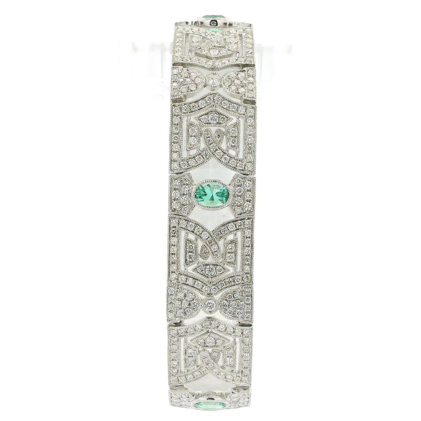 A White Gold Vintage Bracelet with bezel set oval cut natural Emeralds & natural diamonds at Forever Rox Fine Jewelry, Lake Tahoes Best Jewelry Store